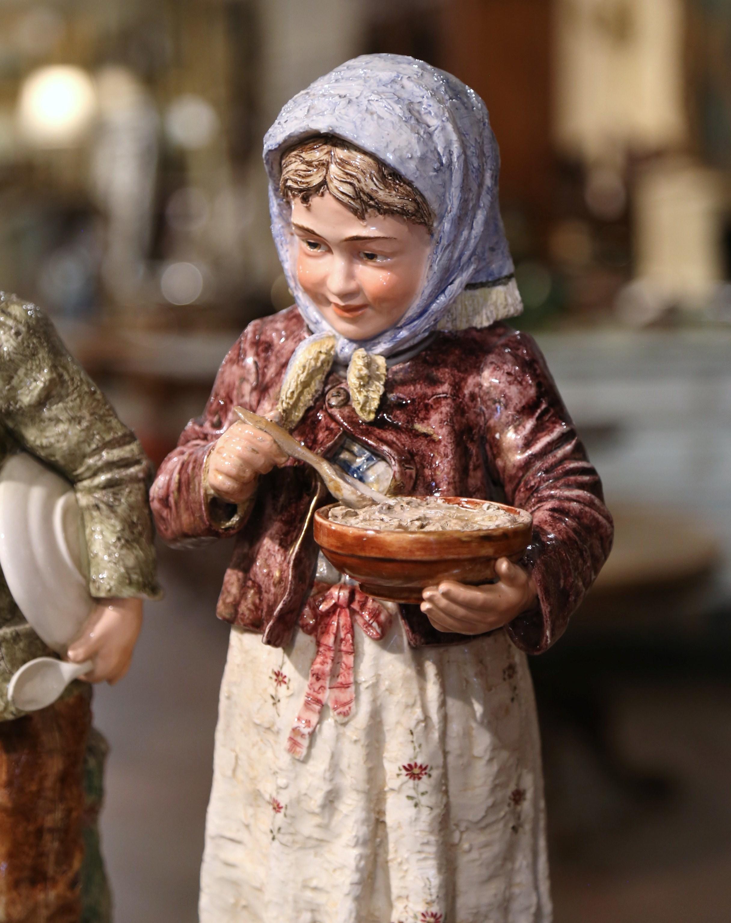 Pair of Early 20th Century French Painted Porcelain Barbotine Children Figurines In Excellent Condition In Dallas, TX