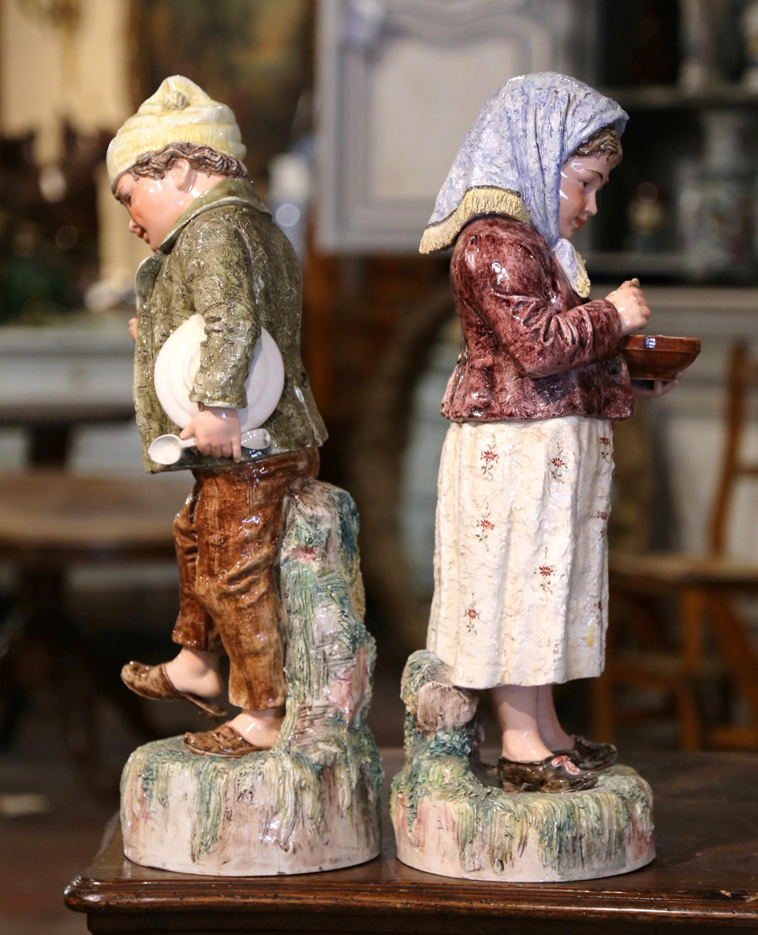 Pair of Early 20th Century French Painted Porcelain Barbotine Children Figurines 3