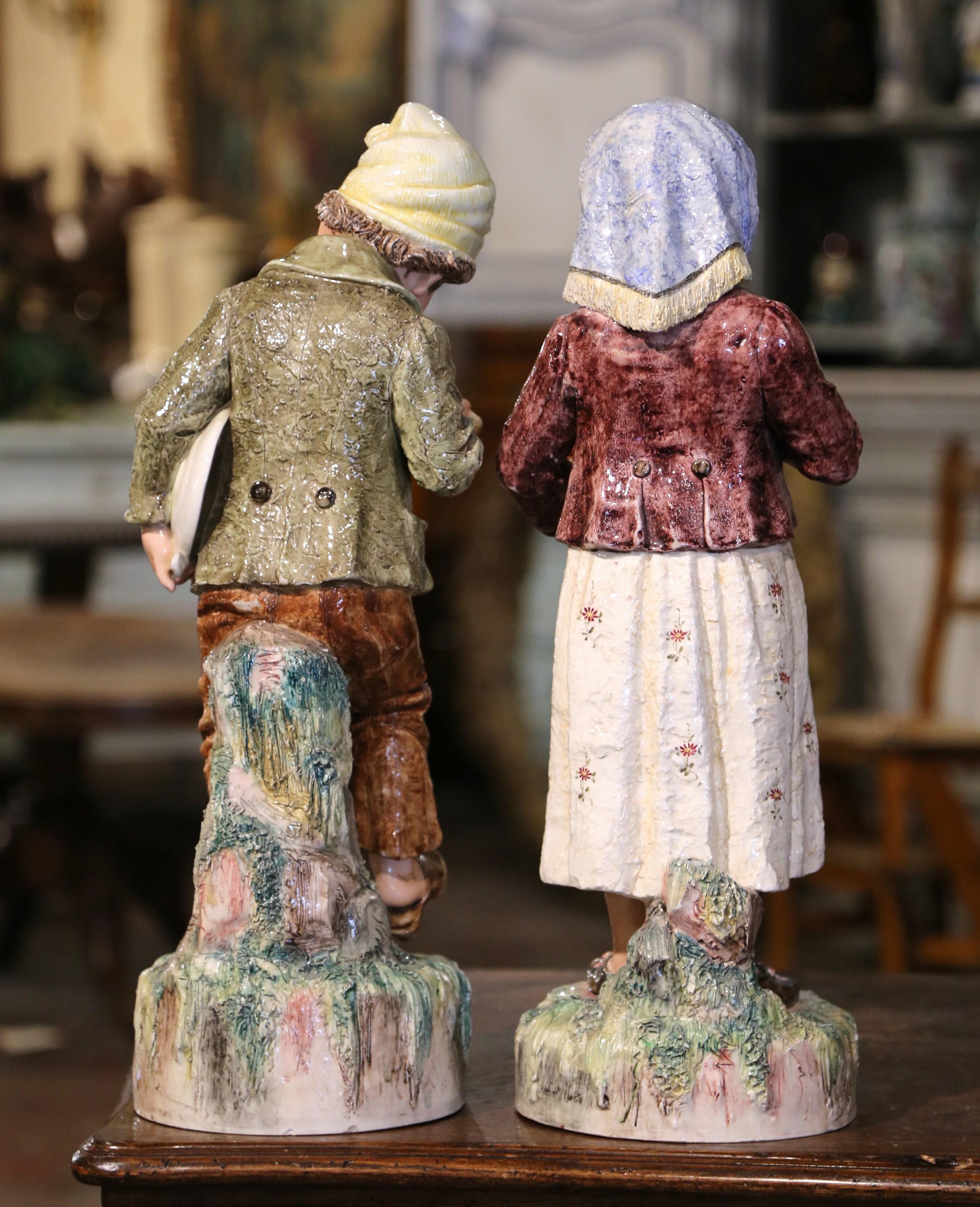 Pair of Early 20th Century French Painted Porcelain Barbotine Children Figurines 4