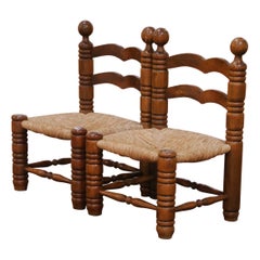 Pair of Early 20th Century French Provincial Low Oak Chairs with Rush Seats