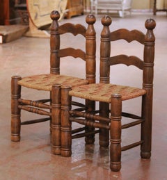 Pair of Early 20th Century French Provincial Low Oak Chairs with Rush Seats