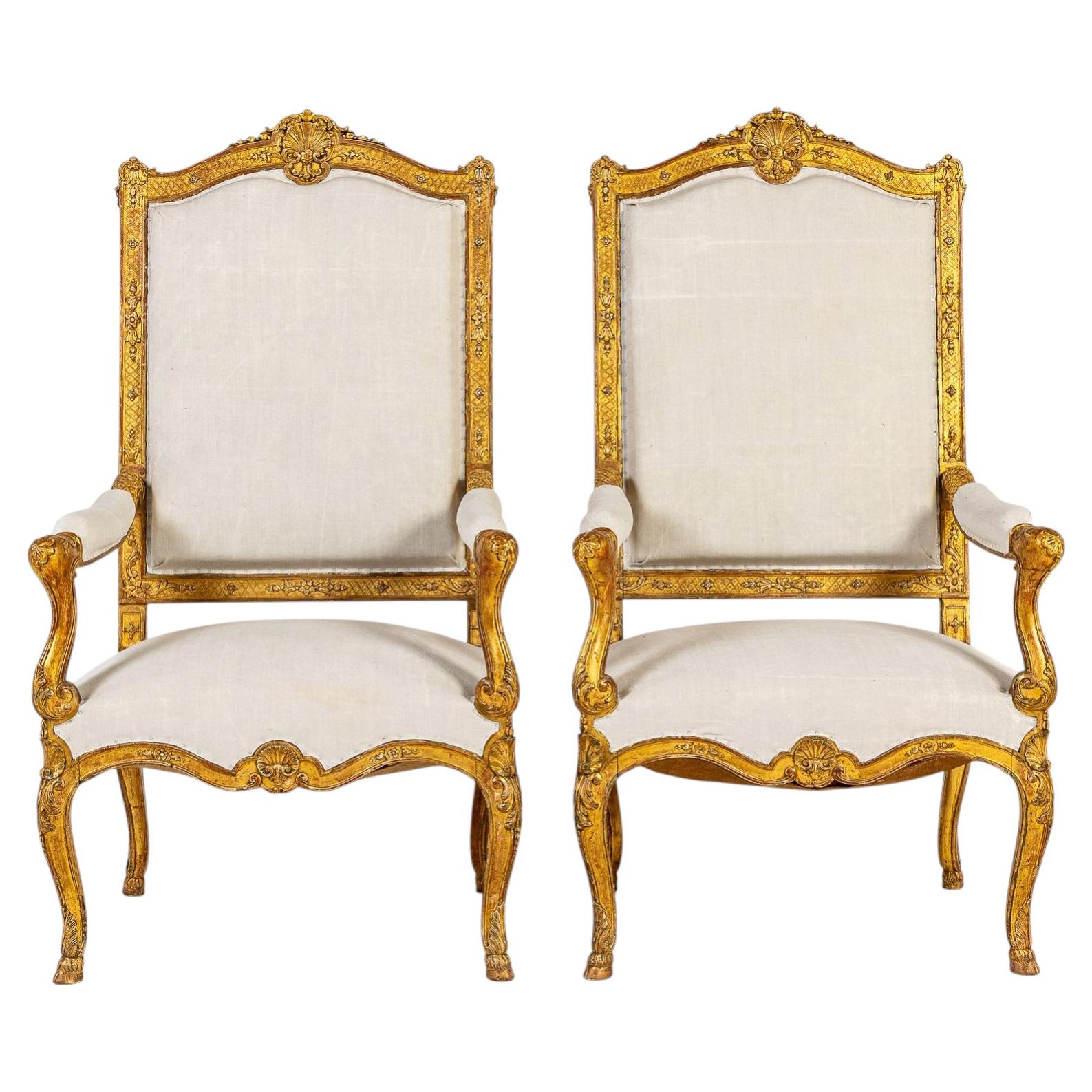 Pair of Early 20th Century French Régence Style Giltwood Armchairs