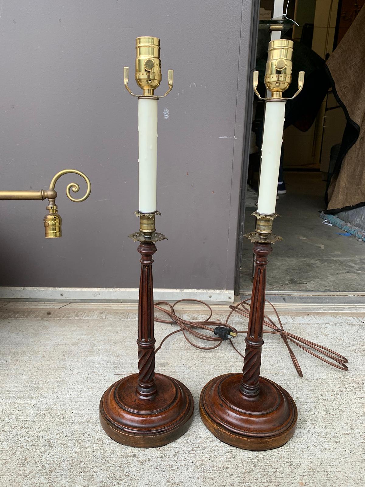 Pair of early 20th century George III style carved wood and brass candlesticks as lamps
New wiring.