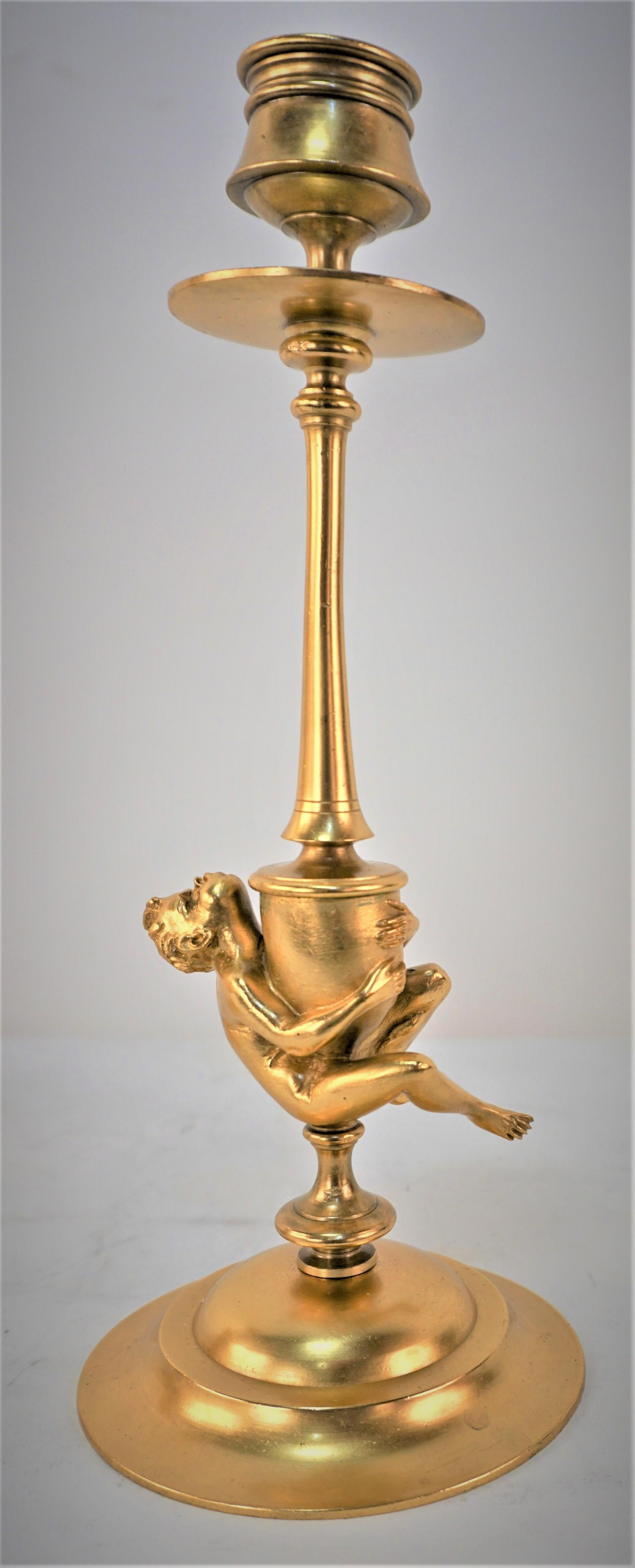 Pair of early 20th century gilt bronze candlesticks.