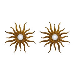 Espejos de sol modernos de mediados de siglo