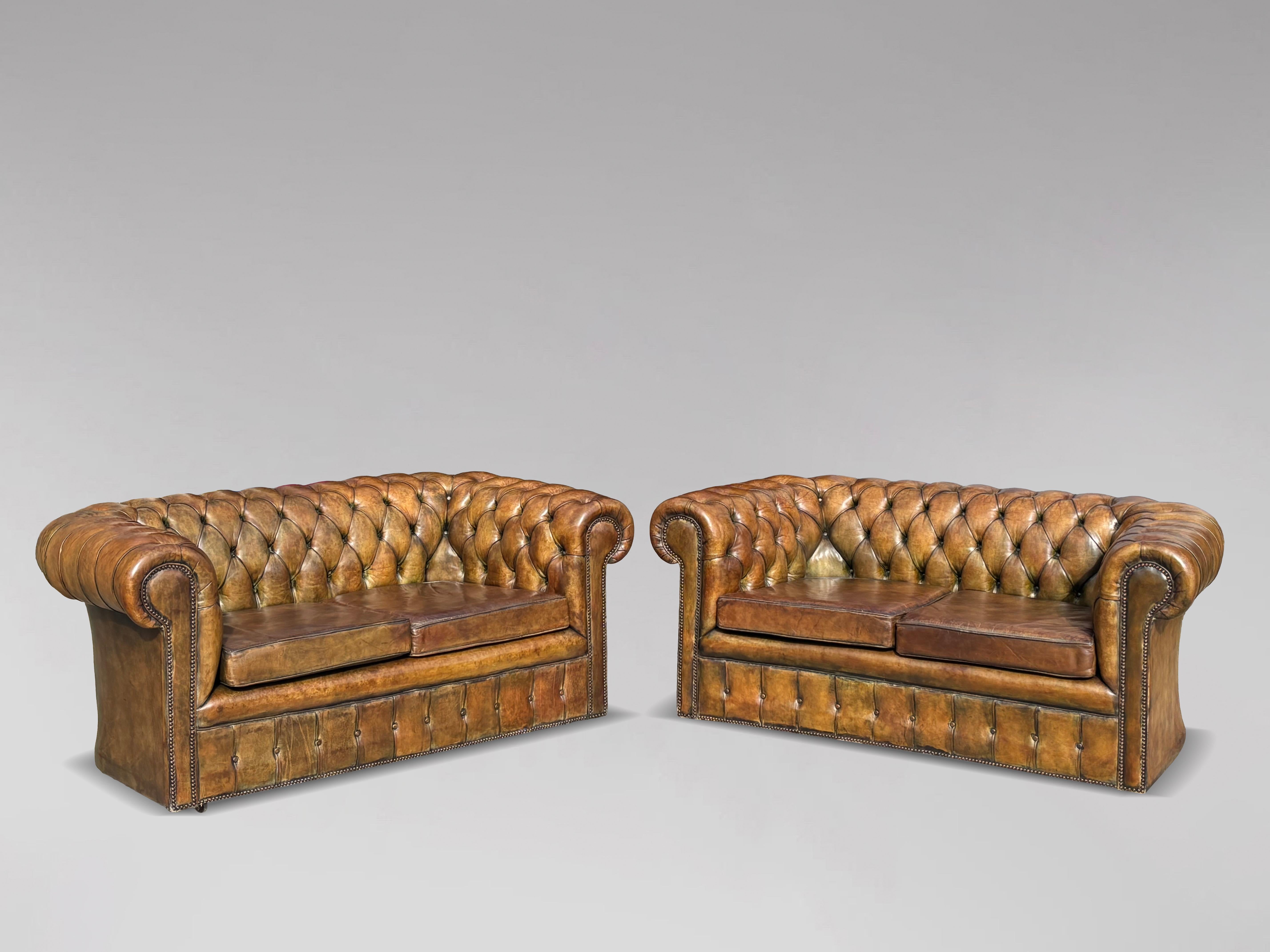 Superb Quality Pair of Early 20th Century Green Leather Chesterfields

A stunning pair of early 20th-century two-seater green/brown leather Chesterfields. They feature the original green brown leather hide that has been cleaned and polished, giving