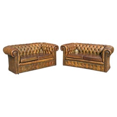 Pair of Early 20th Century Green Leather 2-Seater Chesterfields