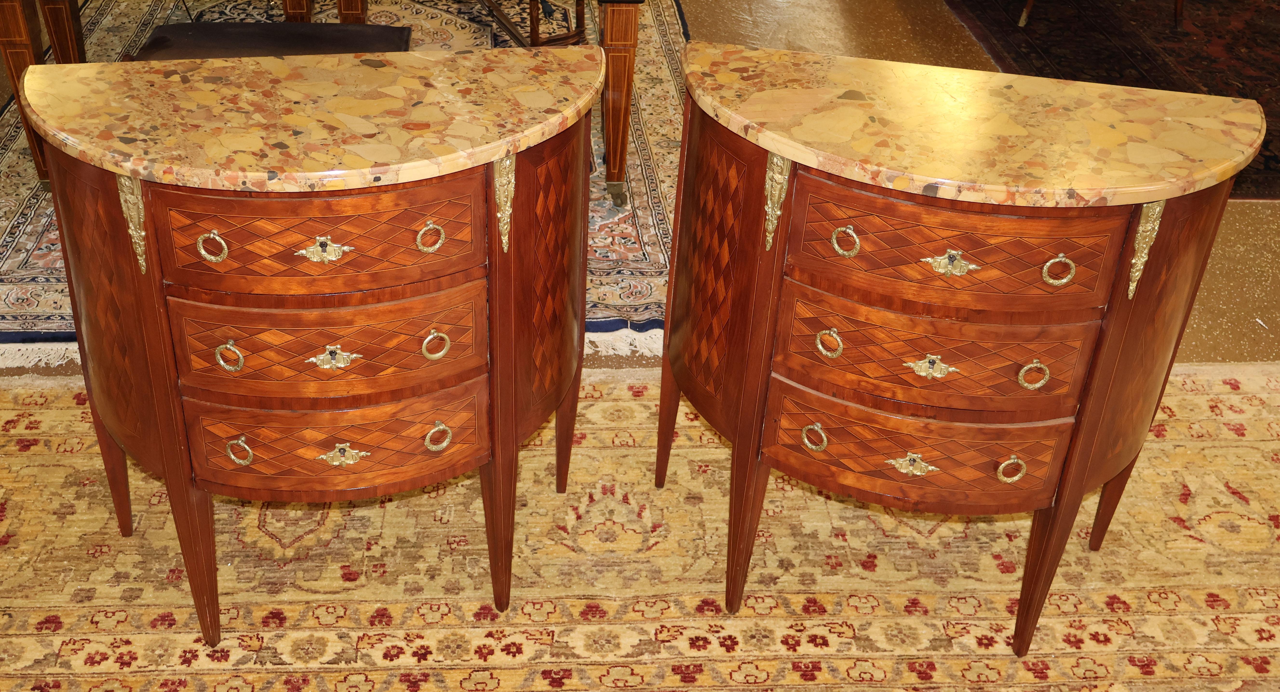 Pair of Early 20th Century Inlaid  French Marble Top End Table Night Stands

Dimensions : 31 X 31 X 15.75

This gorgeous pair of marble top nightstands were made in France in the early 20th century and were imported and sold in NYC. The nightstand