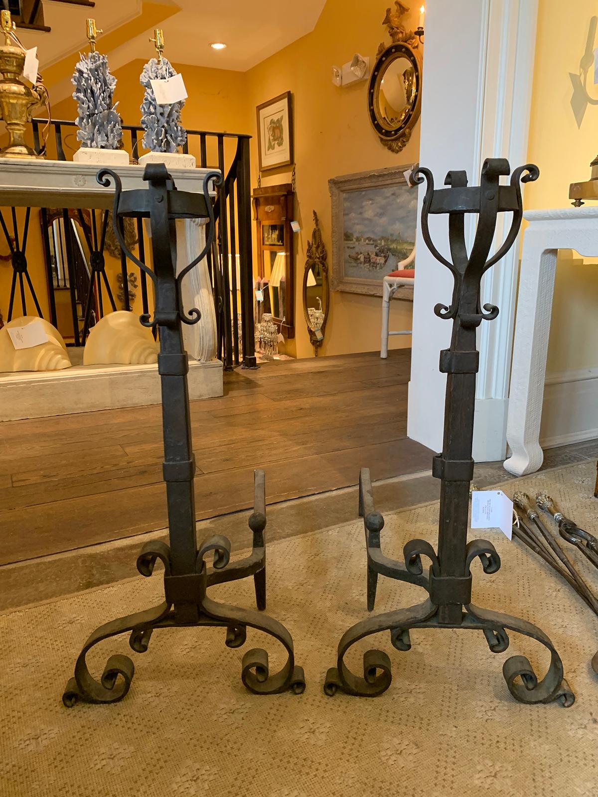 Pair of early 20th century iron andirons with port warmers.