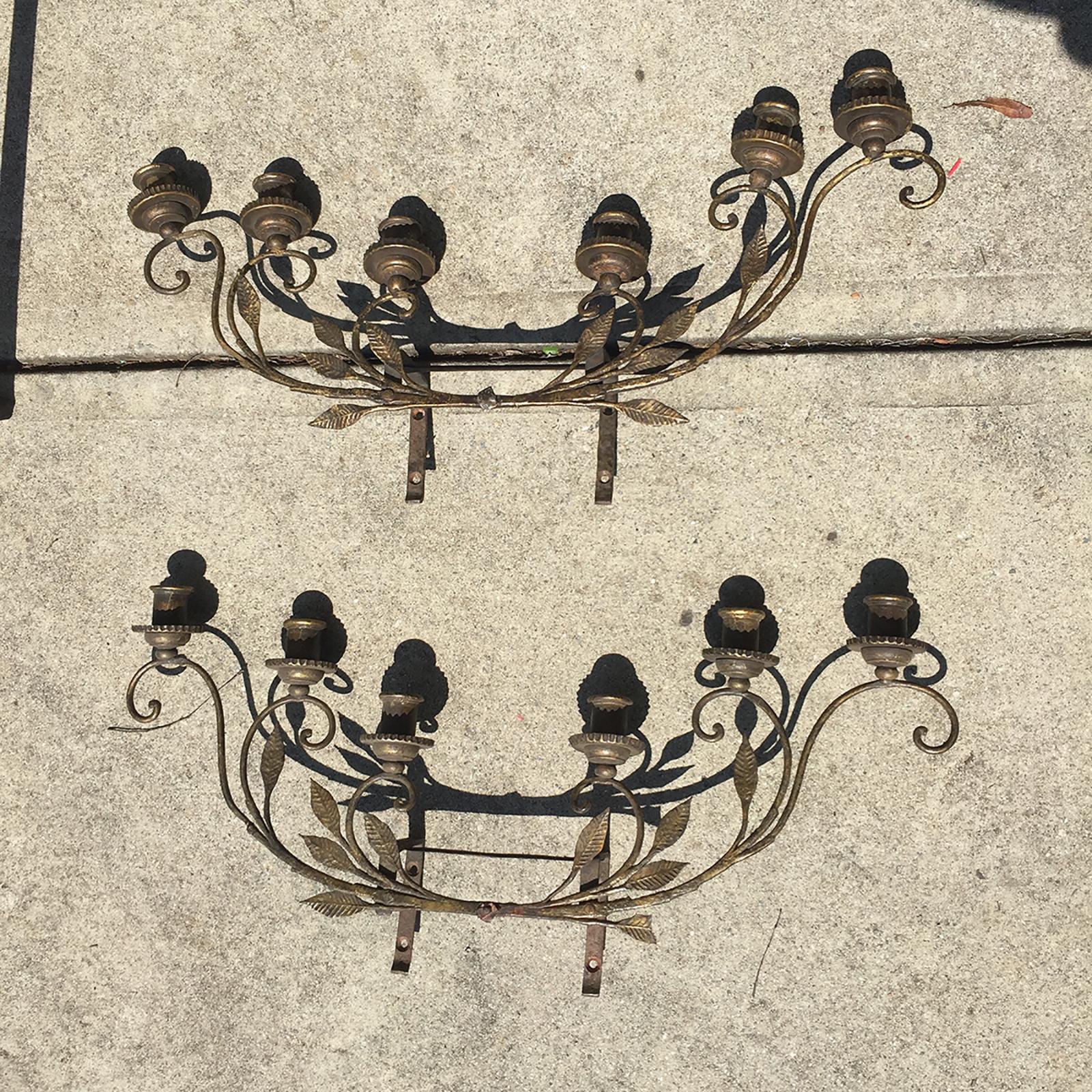 Pair of early 20th century Italian brass six-light sconces with tole and wood candle cups and Iron mounts
These are not wired - for decorative candles.