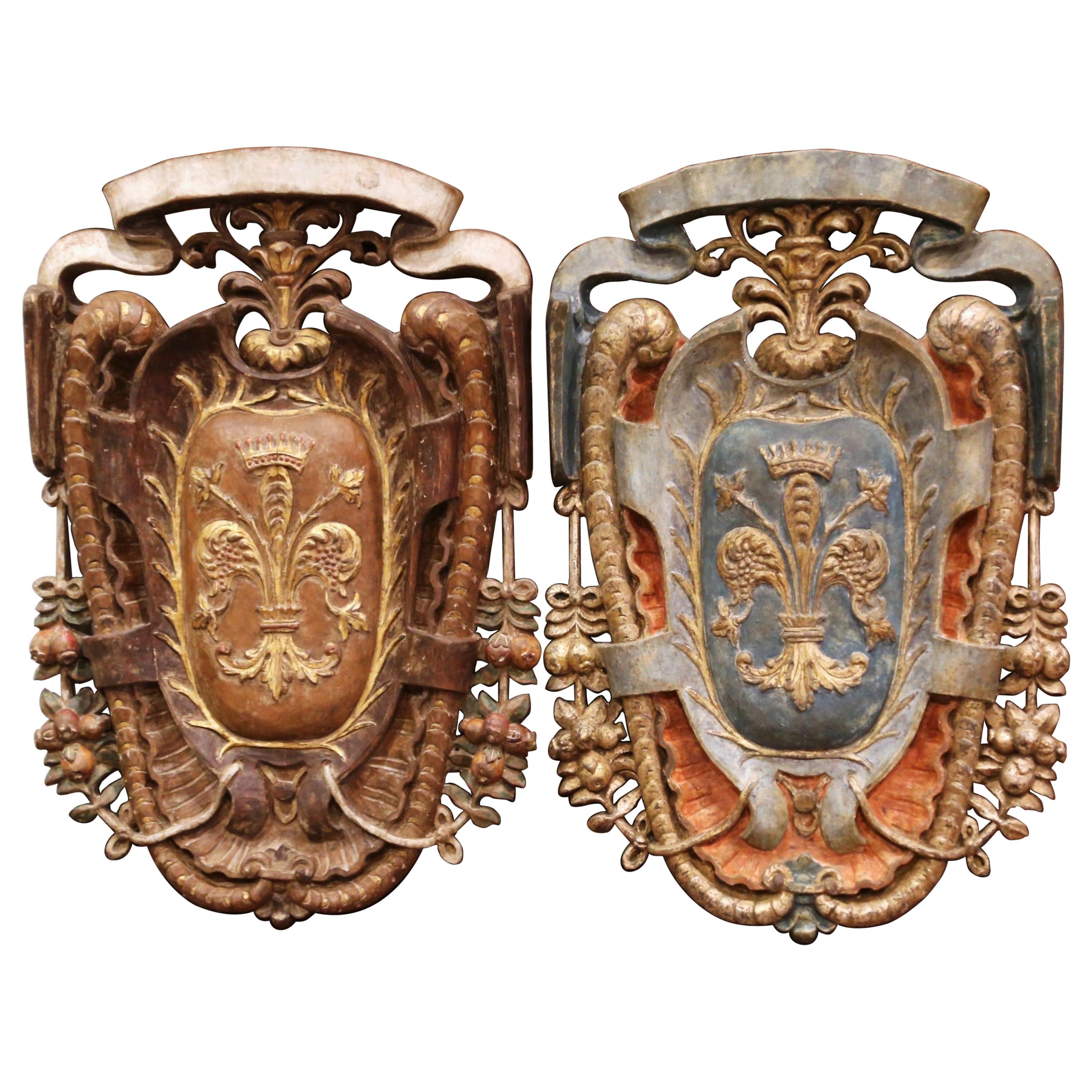 Pair of Early 20th Century Italian Carved Gilt and Painted Wall Hanging Shields