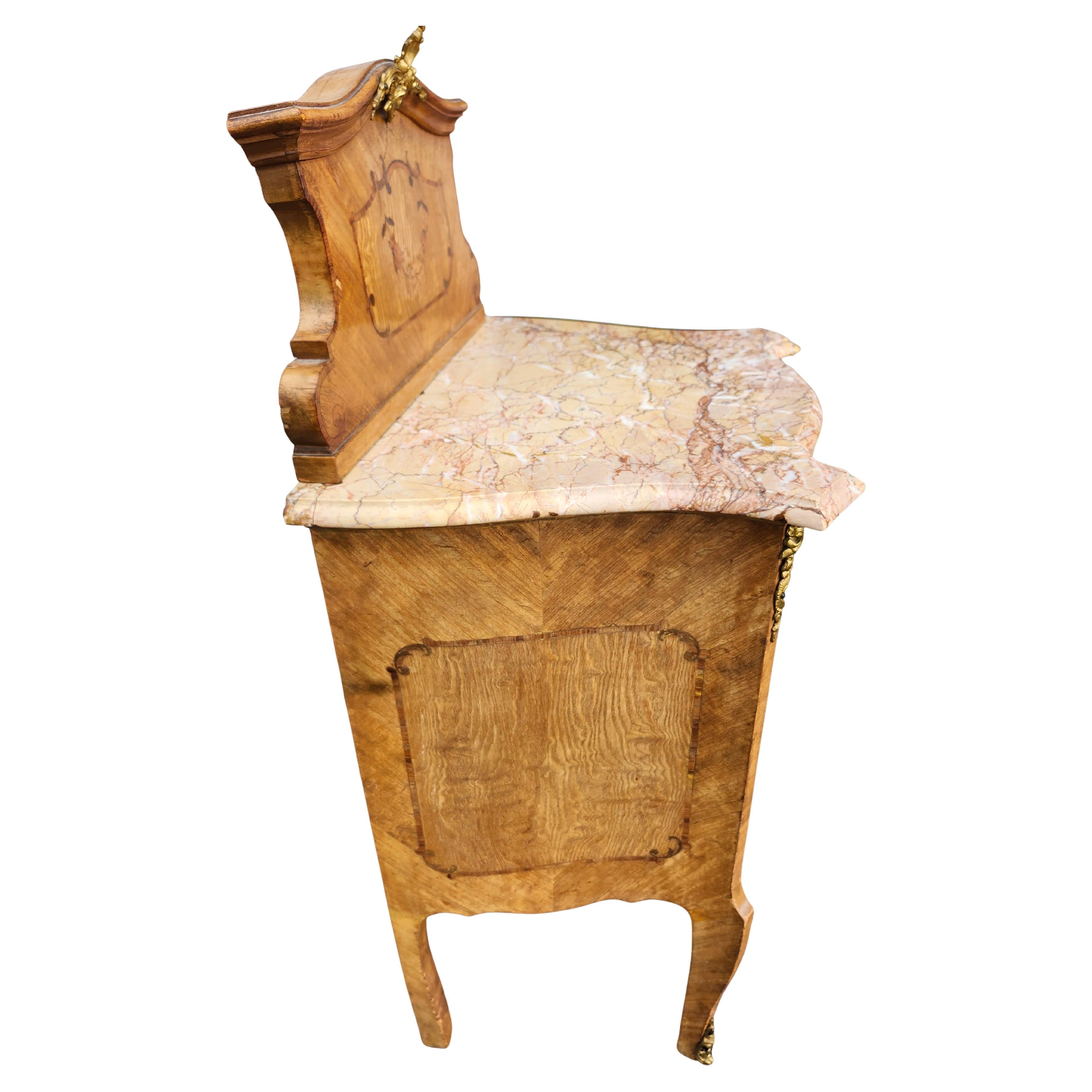 Fabulous pair of marble top night tables in a french / Italian Renaissance style c1935 with Marquetry and inlay, bronze mounts and (porcelain inserts behind each door, see pics, not necessarily functional for today). Shapely cabinets with curves and