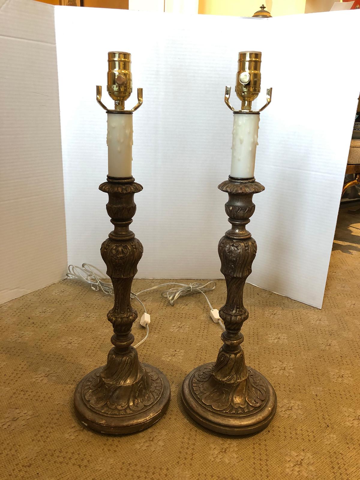 Pair of early 20th century Italian silver gilt candlestick lamps.