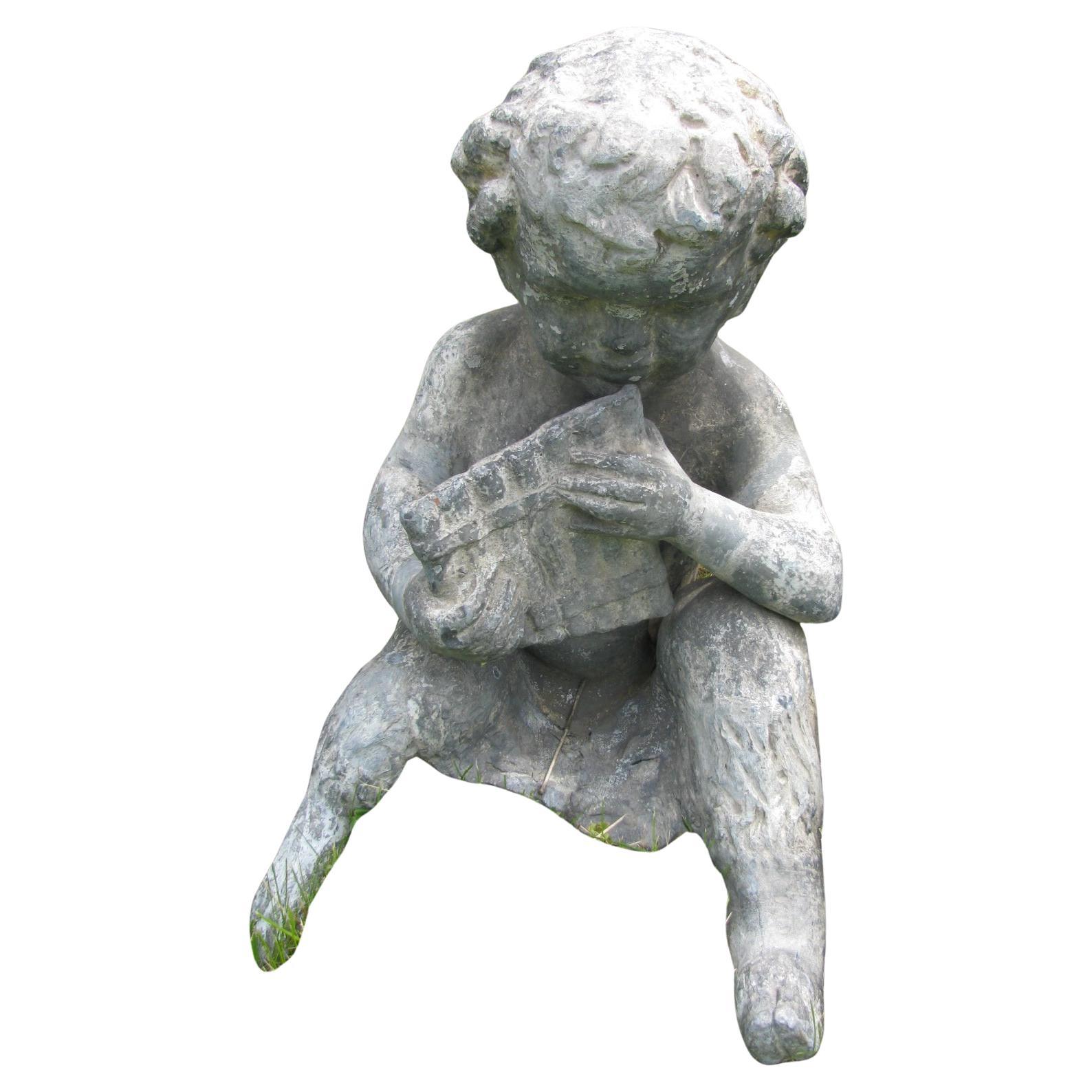 Pair of 19th century zinc figures, boy and a girl with instruments. Very heavy classic figures for the garden. In excellent vintage condition with minimal wear.