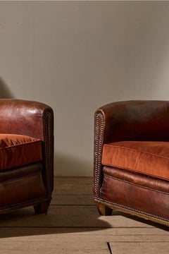 Pair of early 20th century leather club chairs