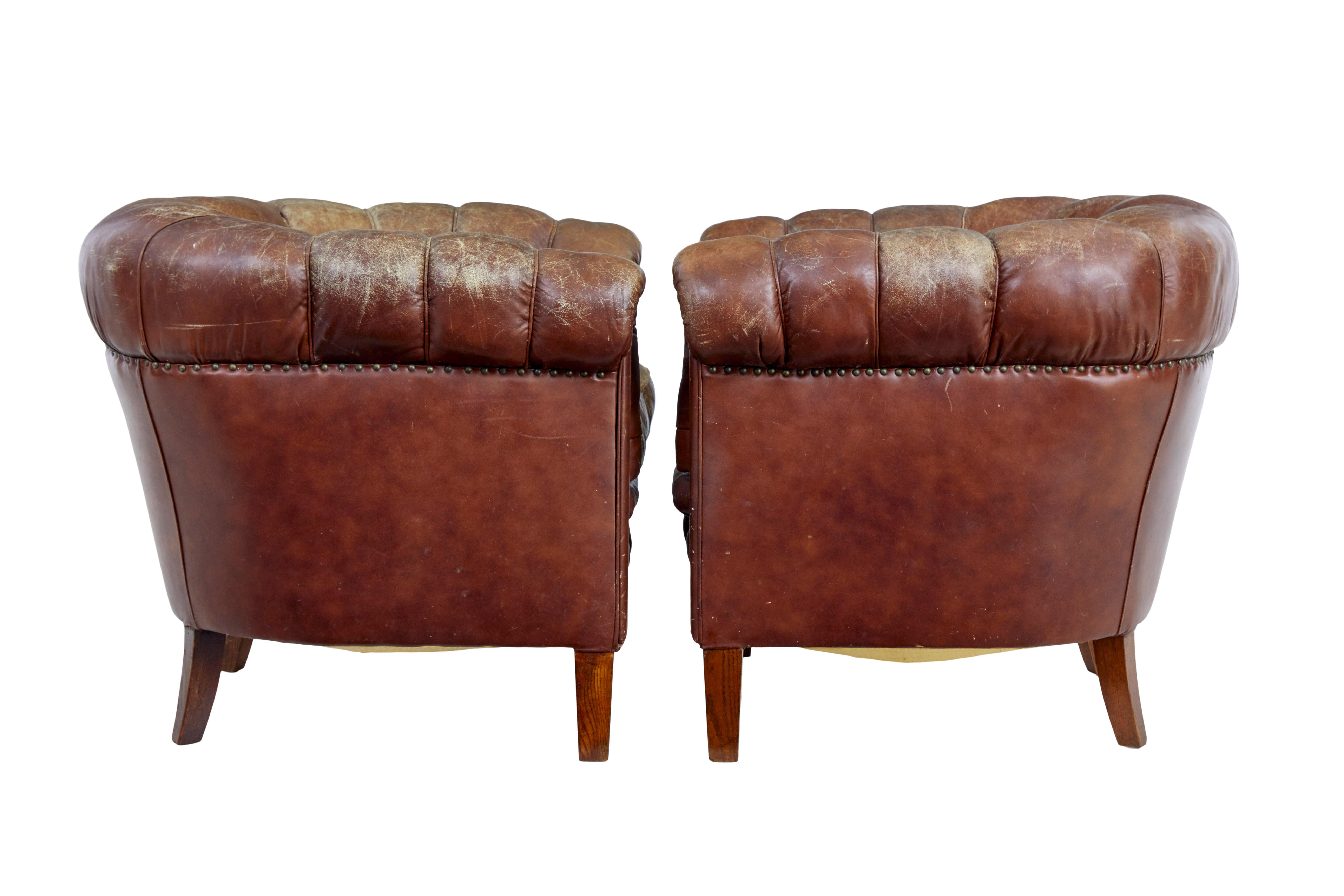 English Pair of early 20th Century leather lounge armchairs For Sale