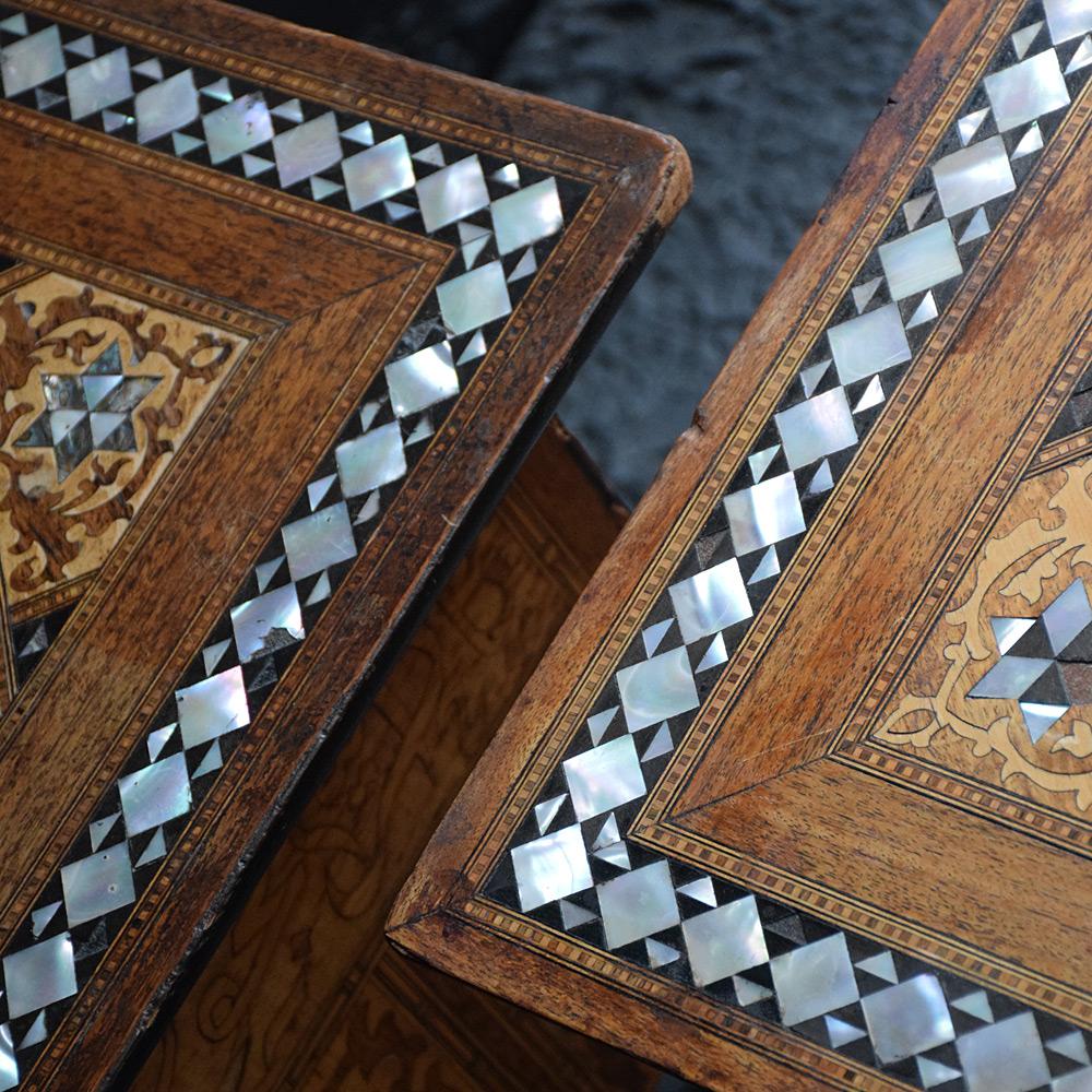 Pair of Early 20th century Liberty & Co tables

We are proud to offer a pair of beautiful early 20th Century large Liberty & Co mother of pearl inlay tables of square form. These highly decorative tables are inlaid with teak, bone, mother of