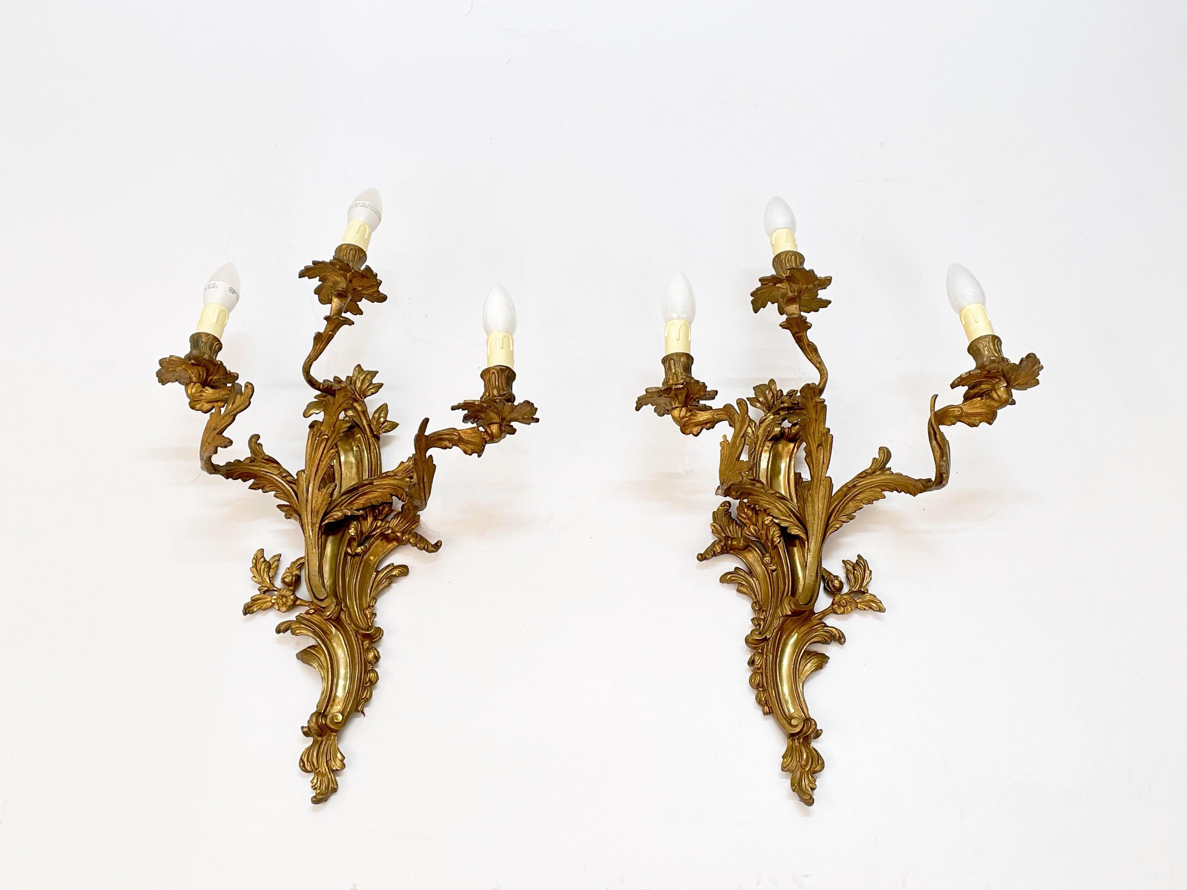 Mid-20th Century Pair of Early 20th Century Louis XV Gilded Bronze and Brass French Sconces