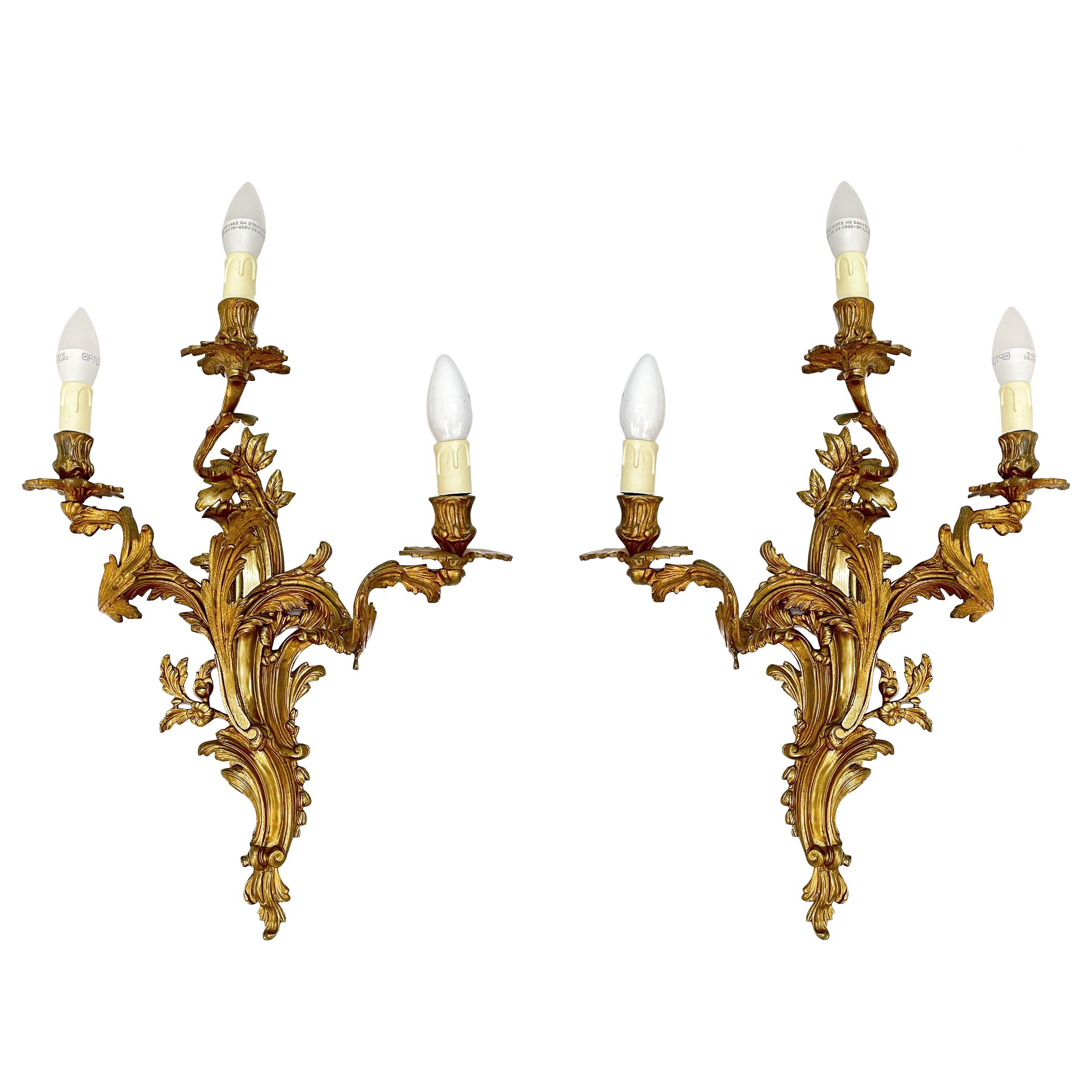 Pair of Early 20th Century Louis XV Gilded Bronze and Brass French Sconces