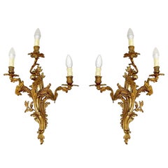 Pair of Early 20th Century Louis XV Gilded Bronze and Brass French Sconces
