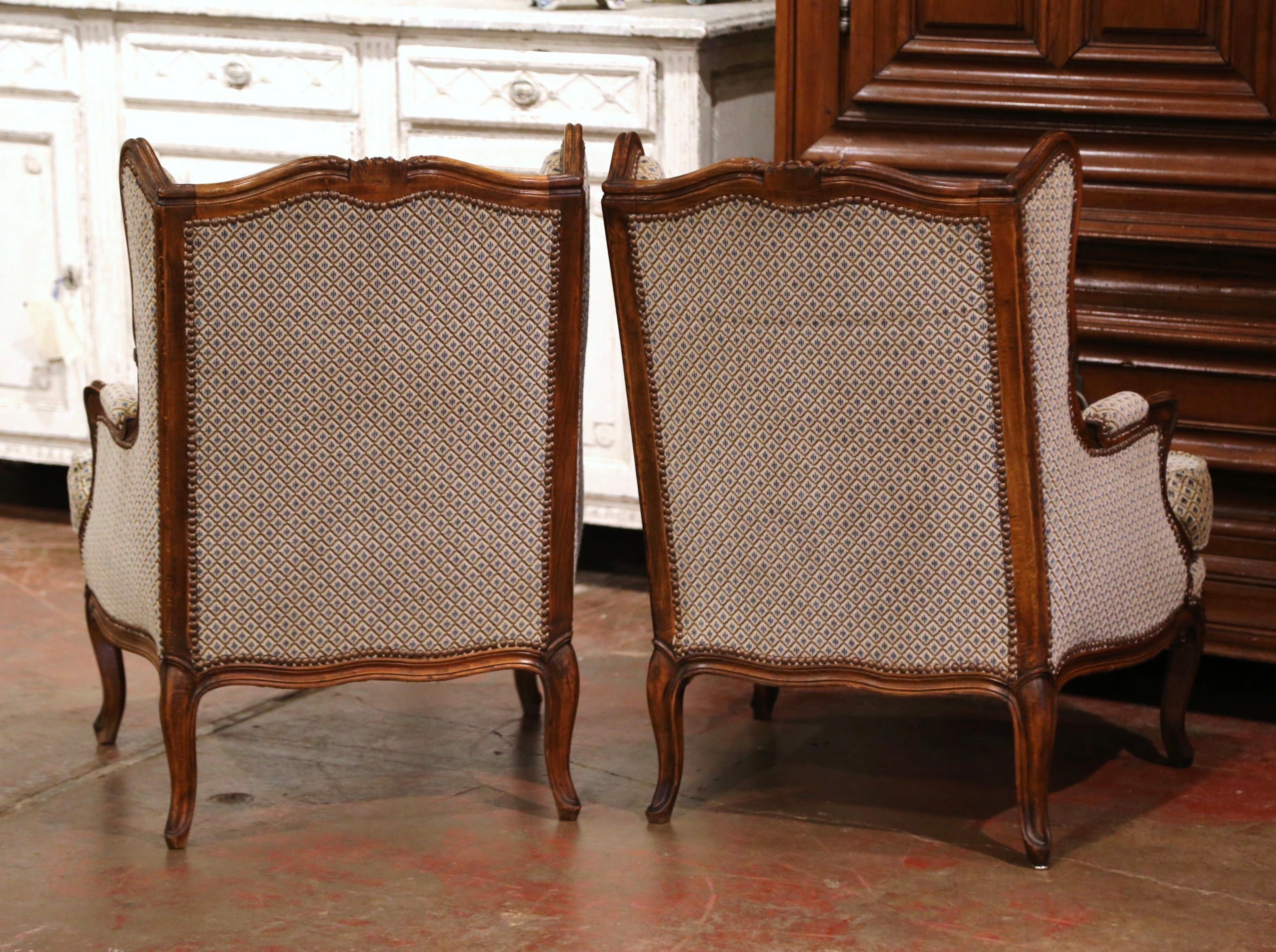 Pair of Early 20th Century Louis XV Provencal Carved Walnut Wing Back Bergeres In Excellent Condition In Dallas, TX