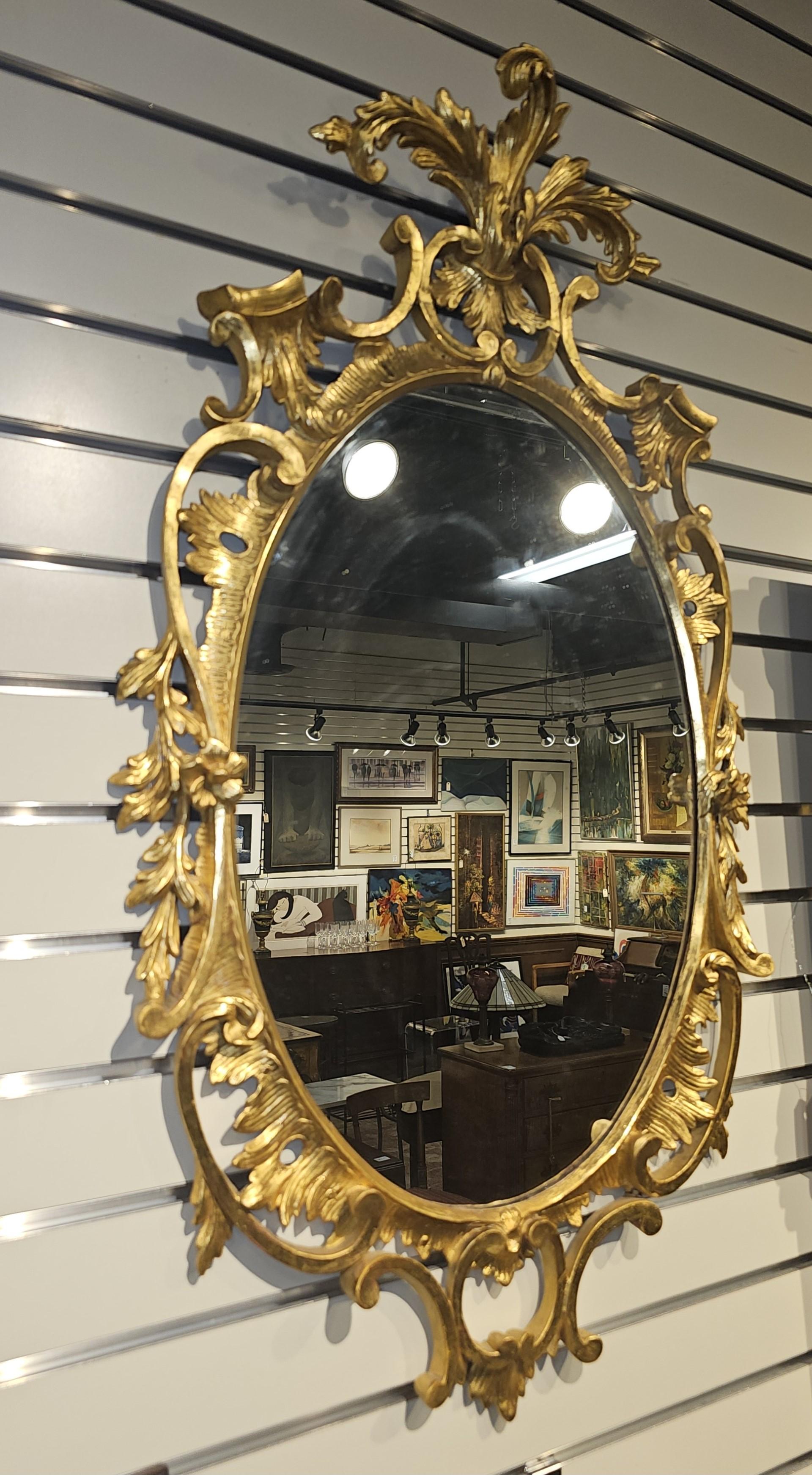 Pair of Early 20th Century Louis XV Style Carved Gilt Wood Frame Oval Mirrors In Good Condition For Sale In Germantown, MD