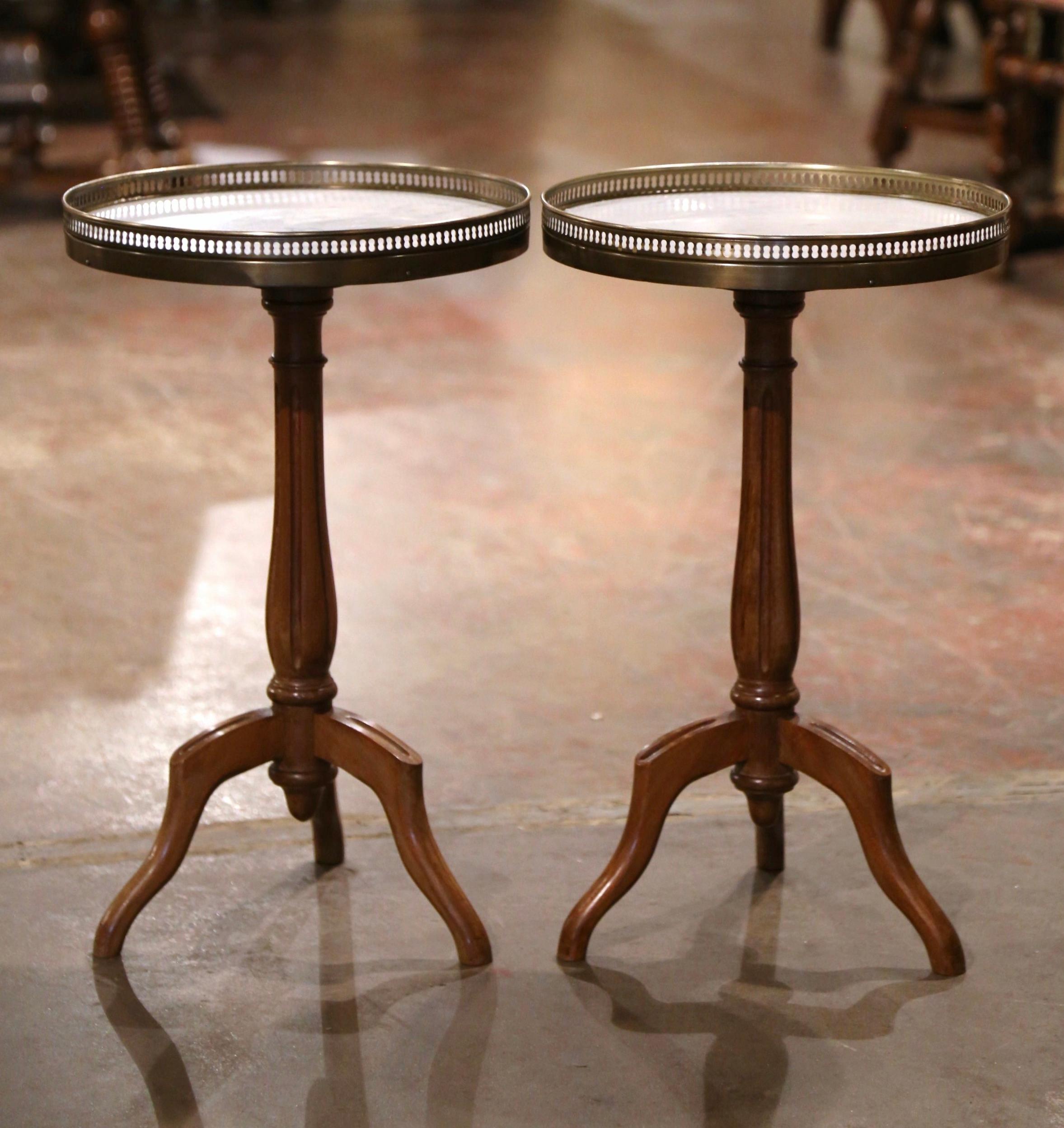 Hand-Carved Pair of Early 20th Century Marble Top Walnut and Brass Pedestal Martini Tables