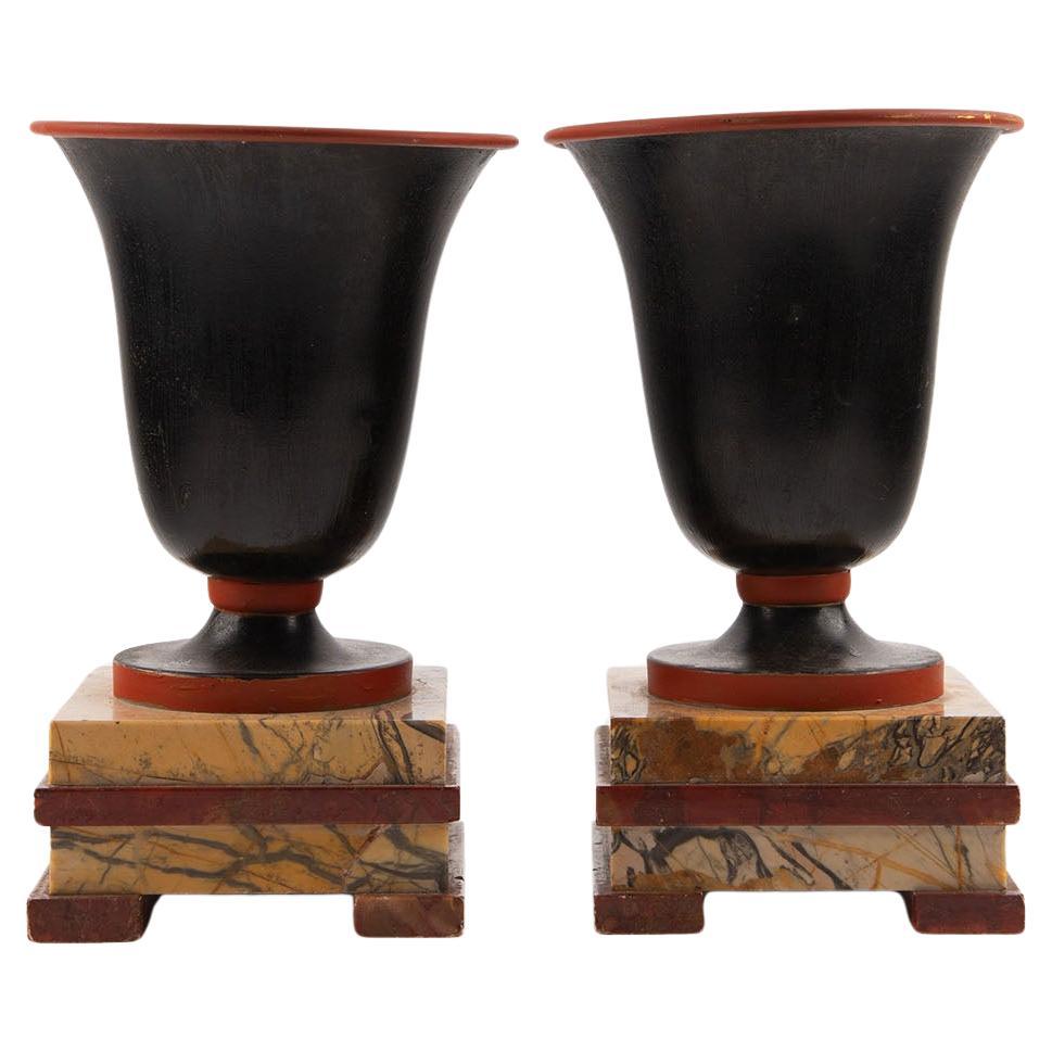 Pair of Early 20th Century Metal Vases on Marble Plinths For Sale