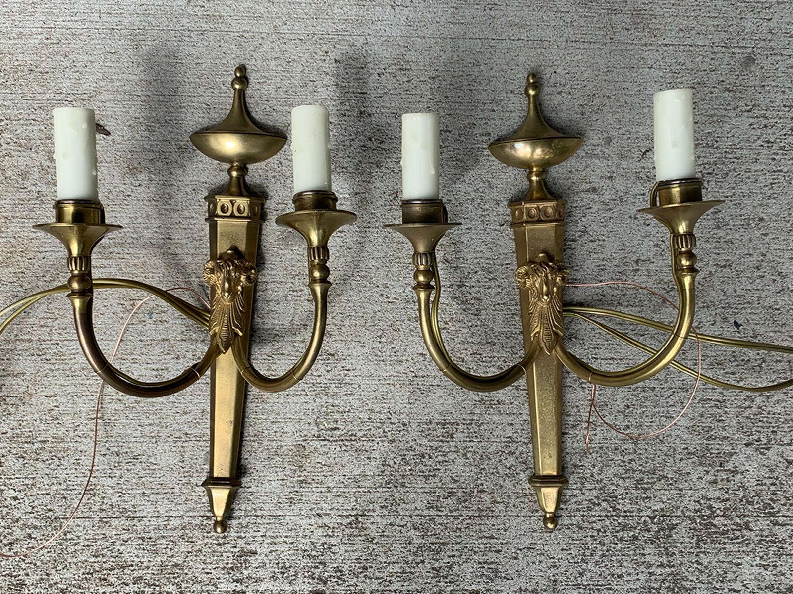 Pair of early 20th century neoclassical brass two-light sconces with rams heads
Brand new wiring.