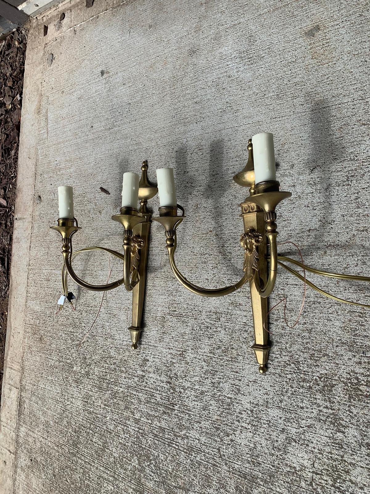 Pair of Early 20th Century Neoclassical Brass Two-Light Sconces with Rams Heads In Good Condition For Sale In Atlanta, GA