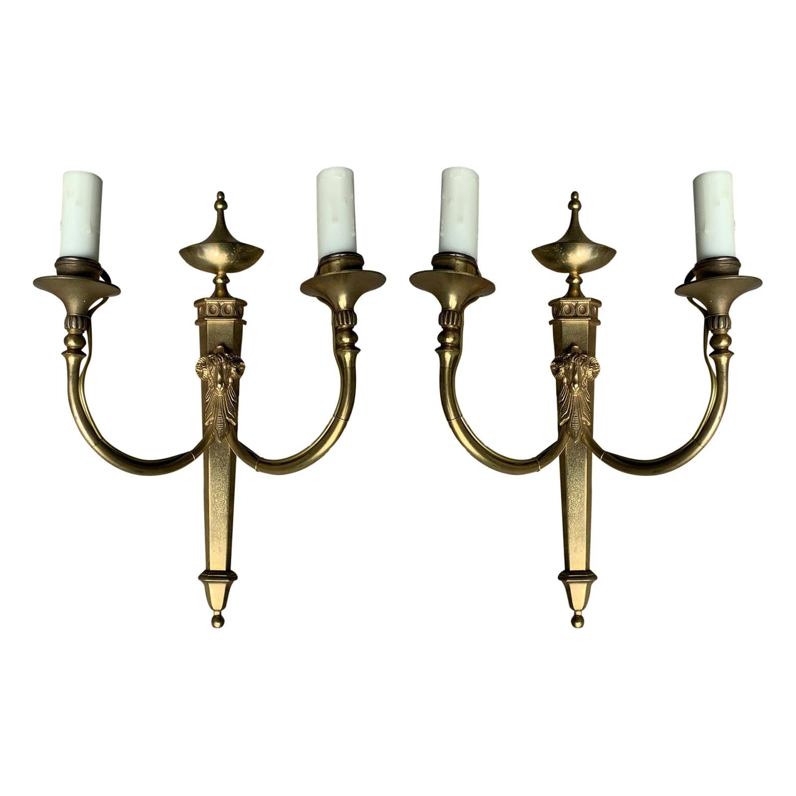 Pair of Early 20th Century Neoclassical Brass Two-Light Sconces with Rams Heads For Sale