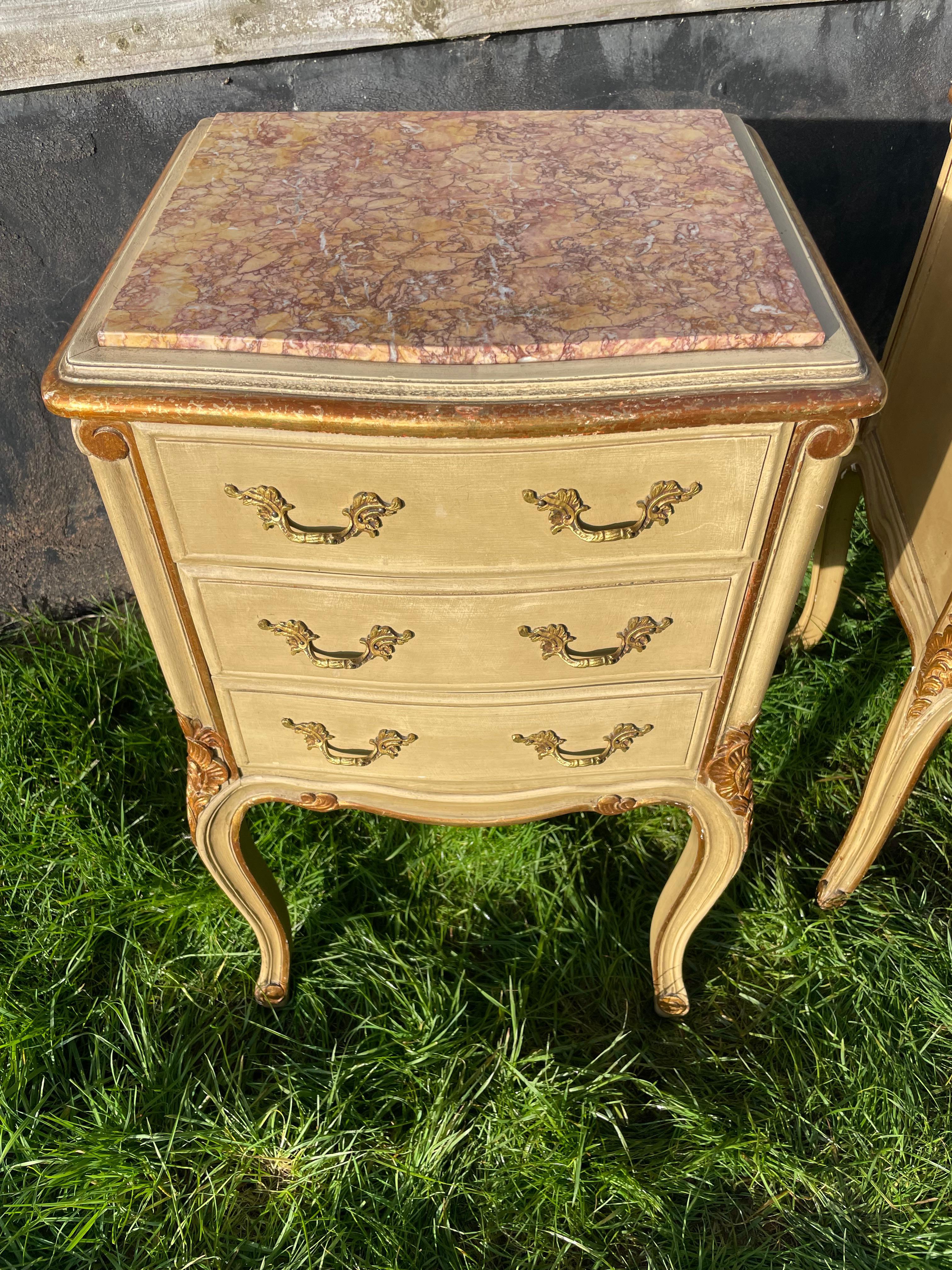 Paint Pair of early 20th century painted and gilded bedside cabinets For Sale