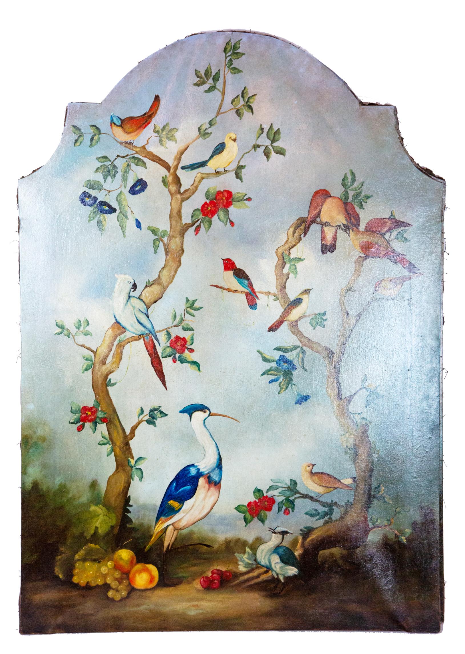 Pair of early 20th century painted birds and fruits on canvas. Two large paintings with colorful tropical birds sitting on trees with fruit beneath. Painted on stretched canvas. Measures: 50