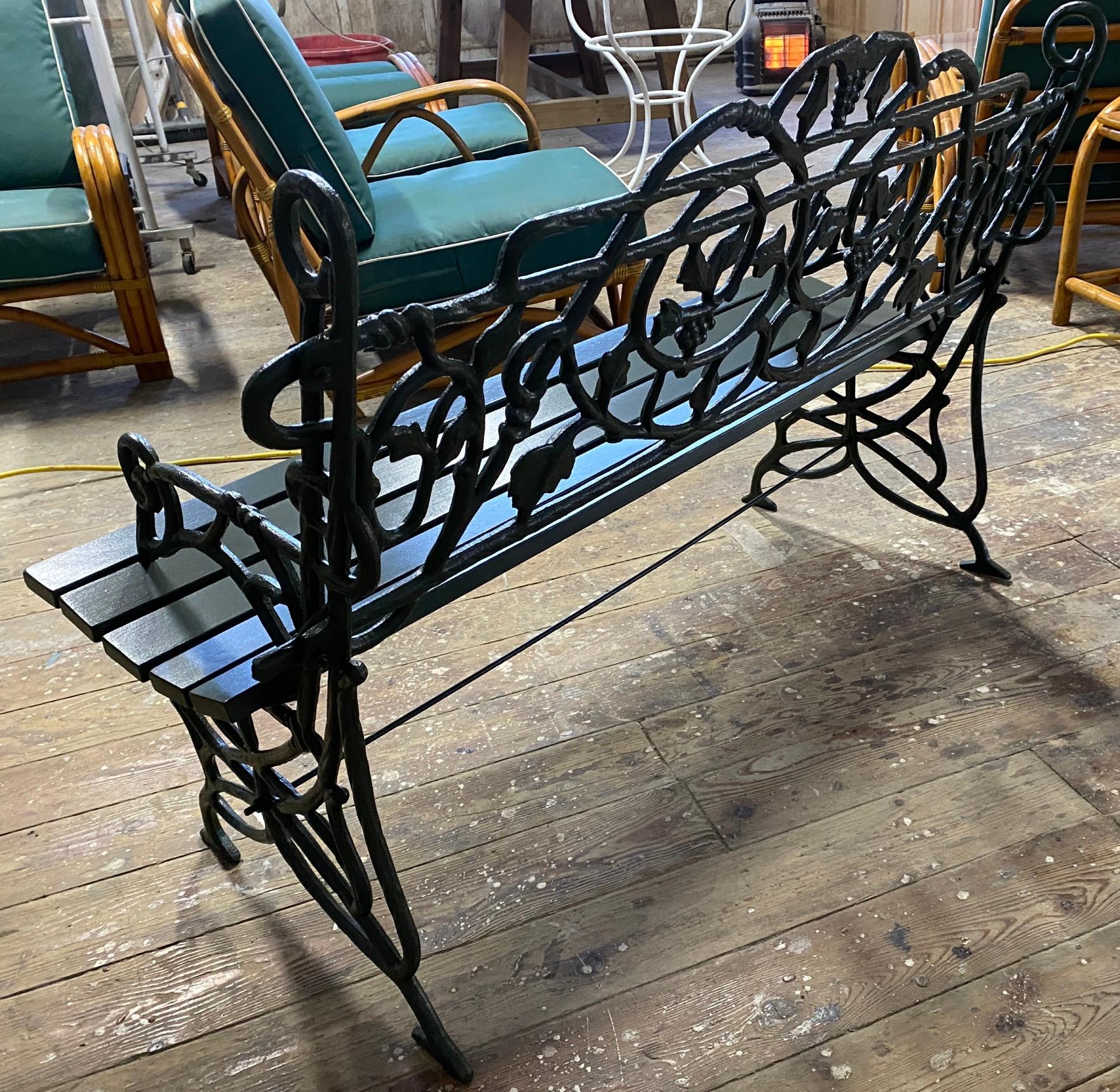 Pair of Early 20th Century Painted Cast Iron Garden Benches with Vine Motifs In Good Condition In Sheffield, MA