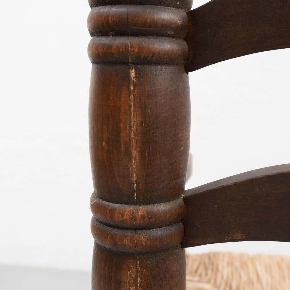 Paire de fauteuils rustiques populaires en bois et rotin du début du 20e siècle en vente 12