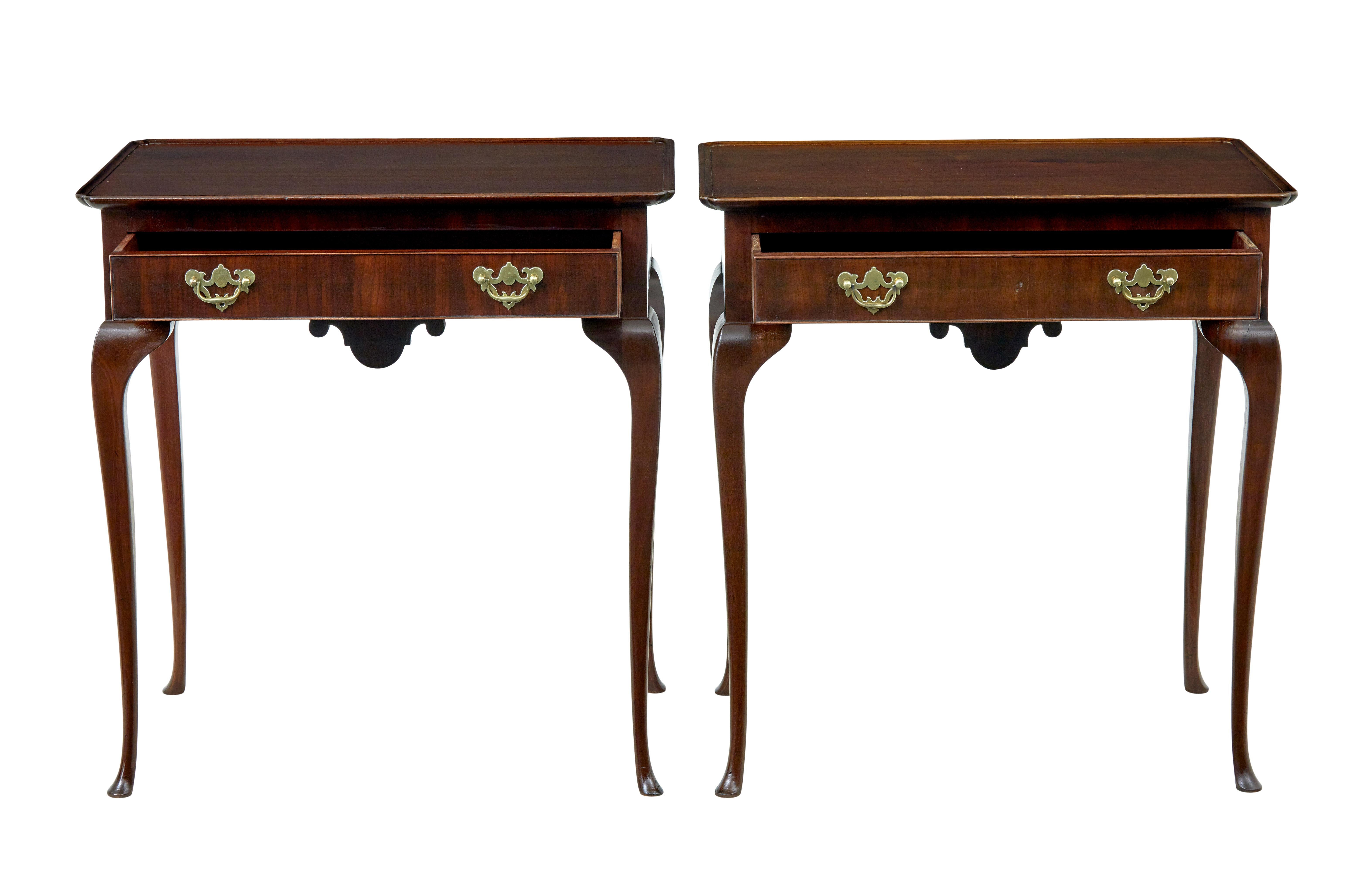 Pair of early 20th century silver side tables circa 1900

Good quality pair of Georgian influenced silver tables, which make an ideal pair of everyday side tables.

Rectangular dish top with a single drawer below, fitted with ornate brass handles. 