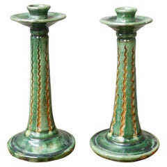 Pair of early 20th century Spanish green glazed candlesticks