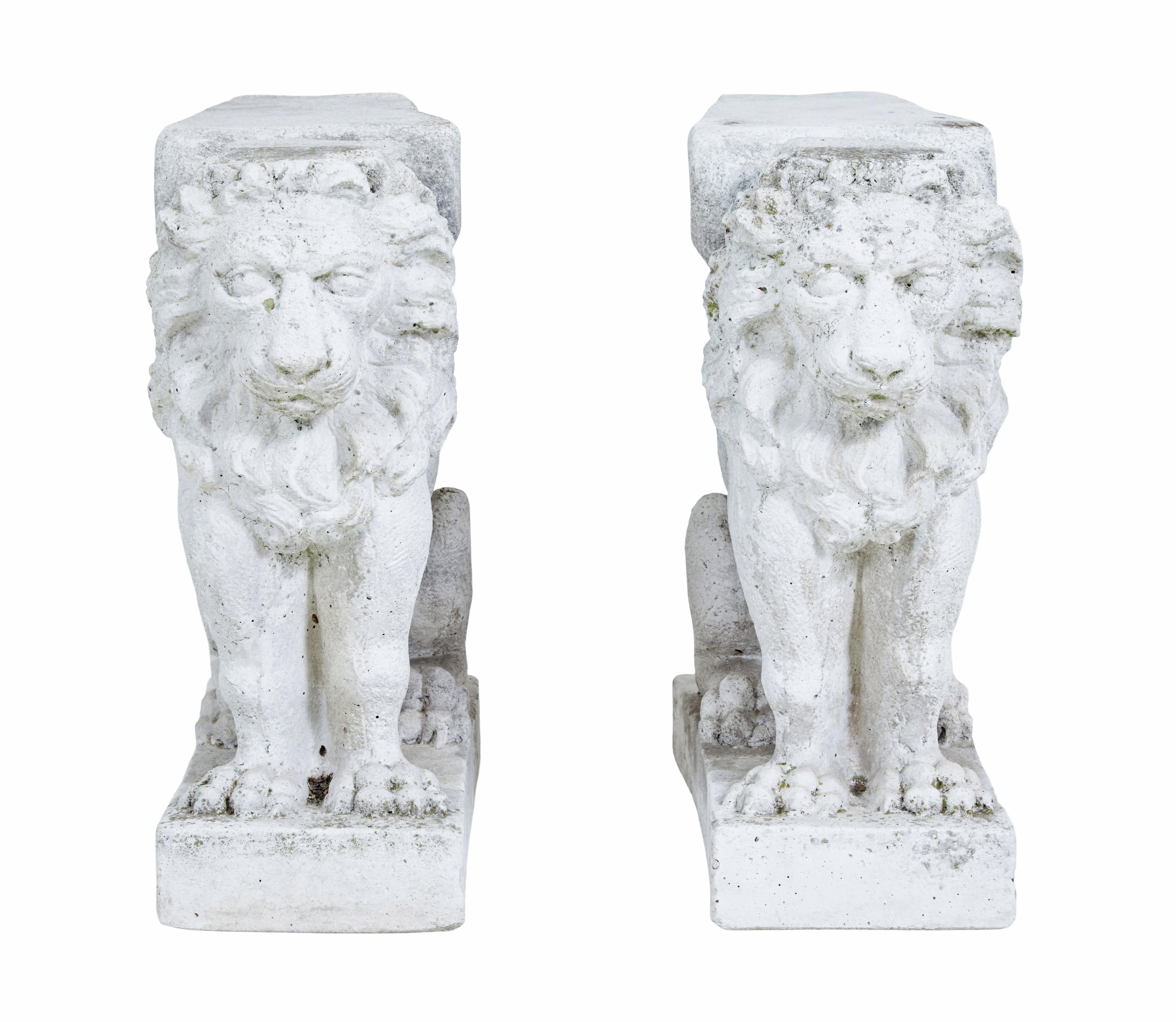 Pair of early 20th century stone garden lion pedestals circa 1920.

Here we have a great pair of architectural stone lions which act as pedestals for a low garden bench with the addition of some woodwork.  Could work equally well as pair pedestals