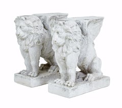 Pair of early 20th century stone garden lion pedestals