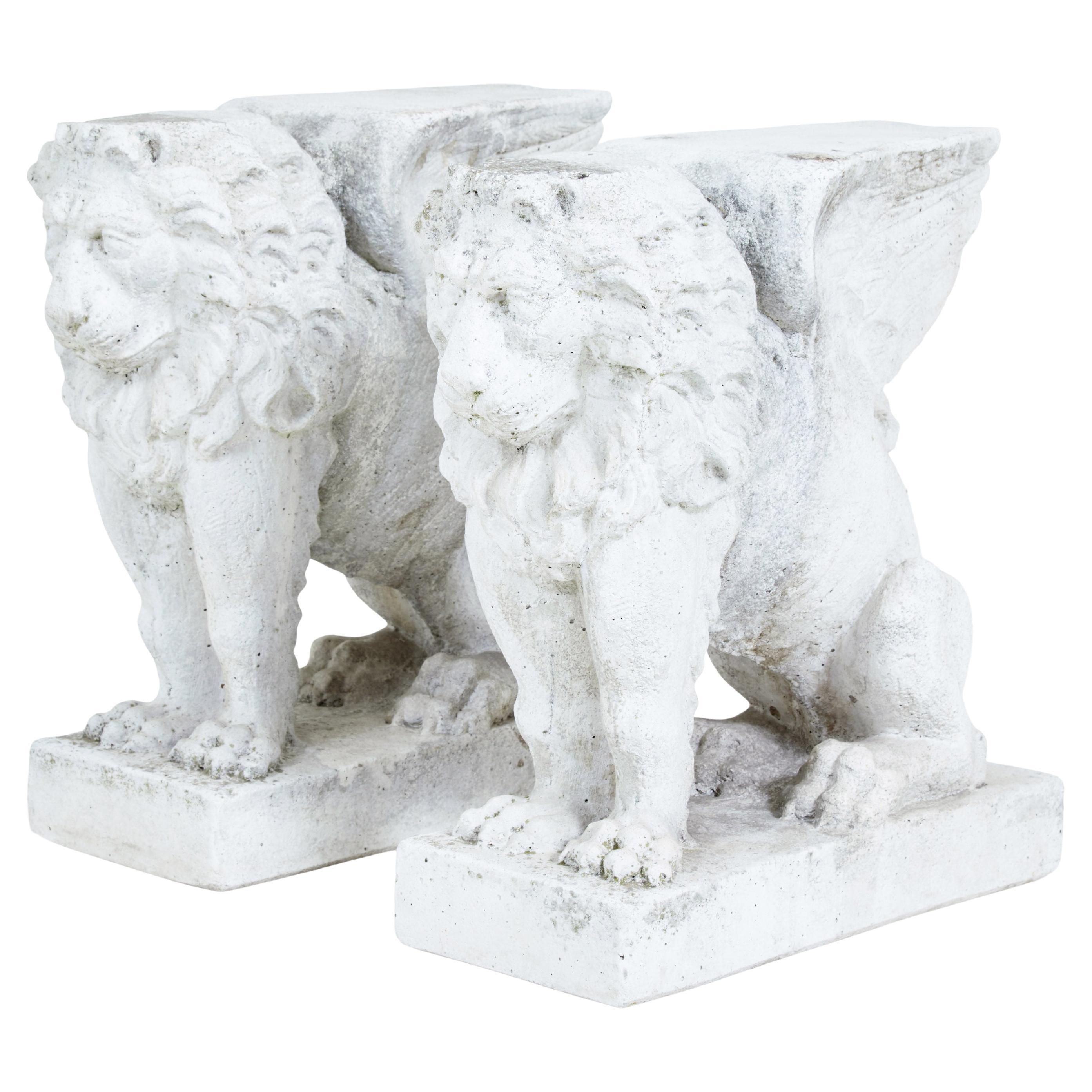Pair of early 20th century stone garden lion pedestals