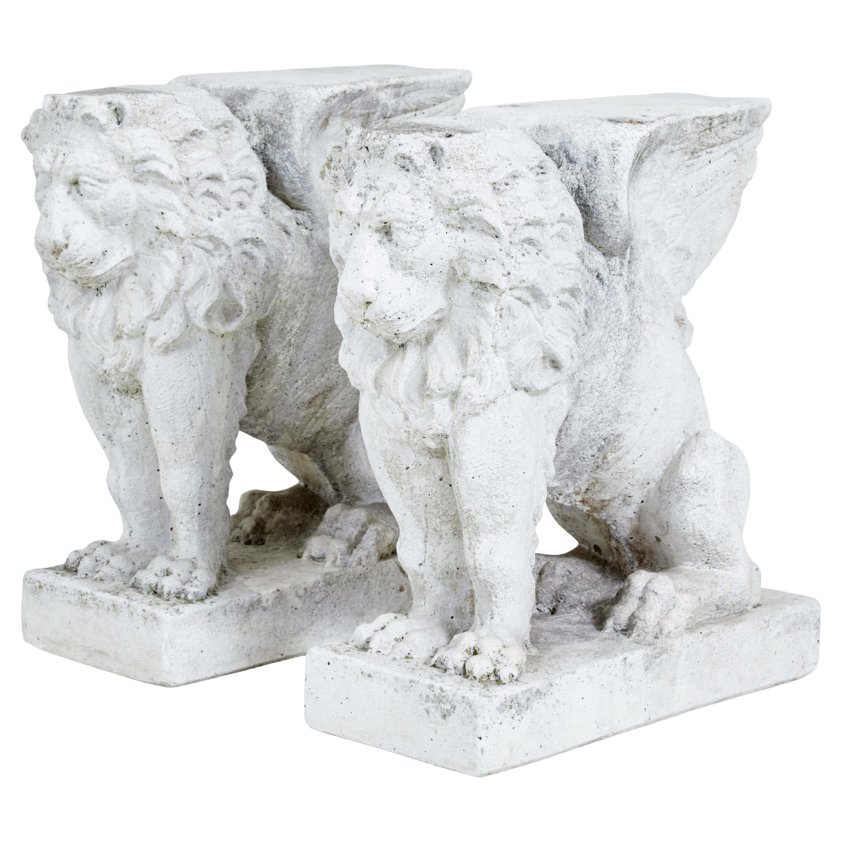 Pair of early 20th century stone garden lion pedestals For Sale