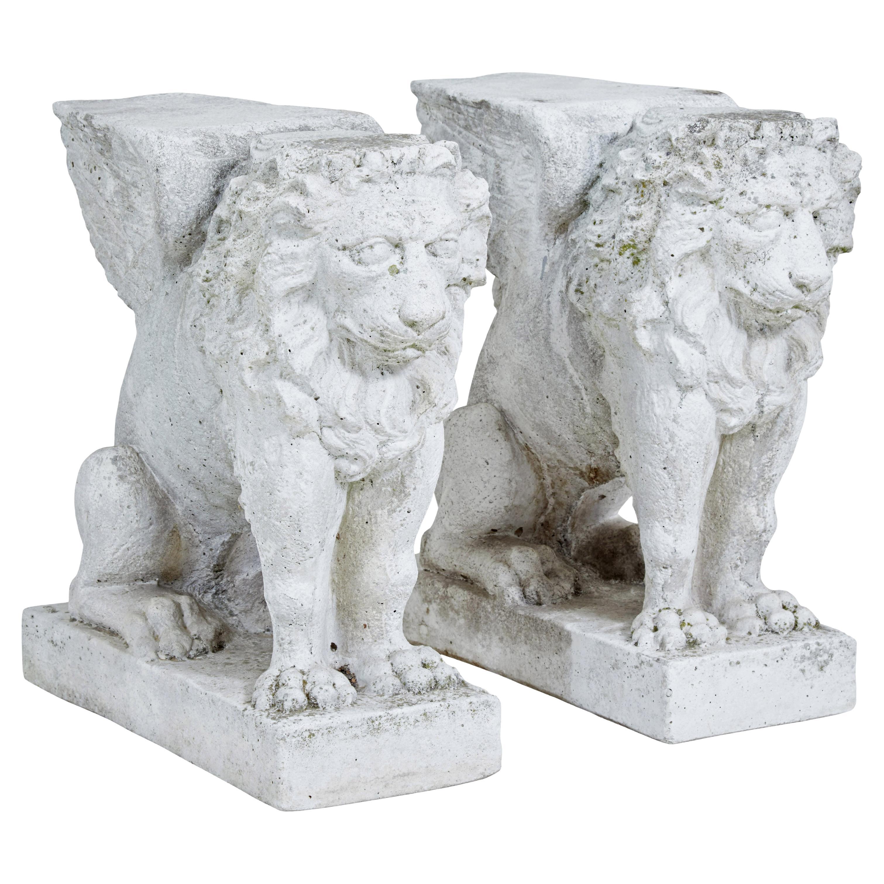 Pair of early 20th century stone garden lion pedestals
