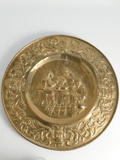 Pair of Early 20th-Century Tudor Style Repoussé Brass Wall Plates, Set of 2