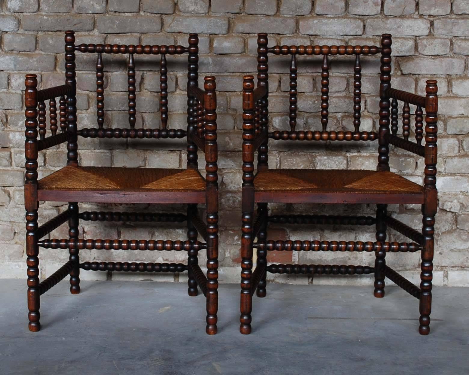 This beautiful pair of Dutch Bobbin chairs were made in the early 1900s.
They originate in the southern part of the Netherlands and they are also known as 'Brabantse knopstoel' or knob chair.
The chairs were made in beechwood and have rush