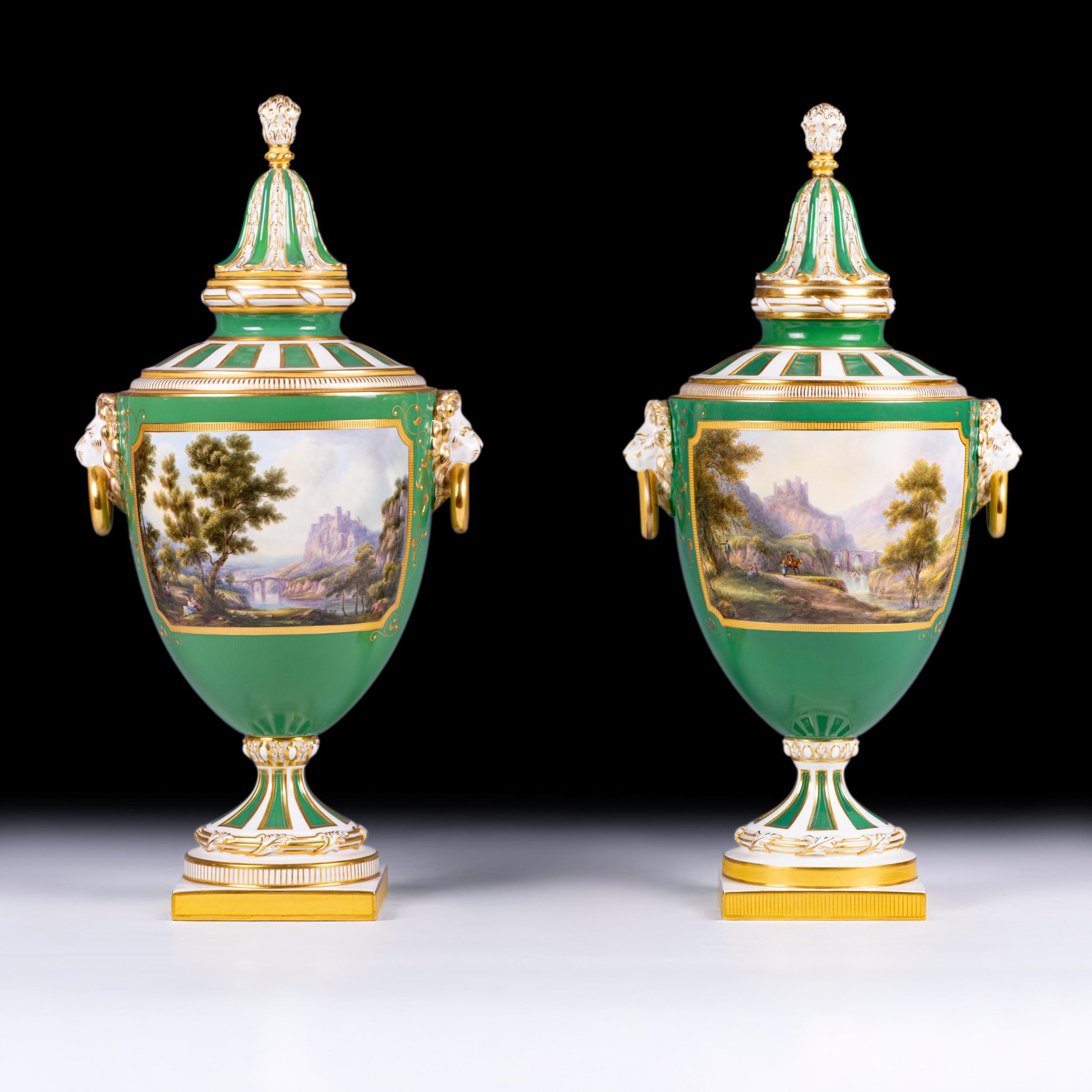 A Fine Pair of Royal Worcester Covered Vases, Signed Harry Davis.

Each ovoid vase finely painted by Harry Davis with a continuous romantic landscape depicting a castle in a wooded river valley with figures and a bridge, within a gilt tooled