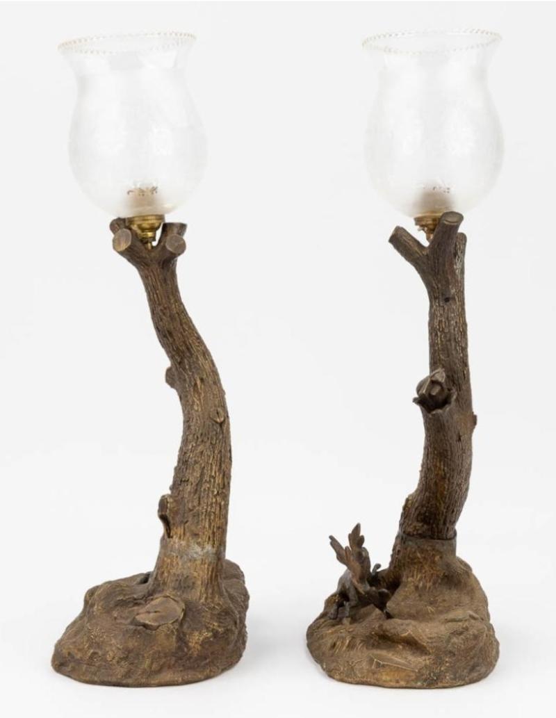 Pair of early 20th century bronze & Venetian glass lamps in the shape of tree trunks depicting hunting scene. One lamp has a deer and the other a hunting dog. Both lamps have etched glass shades. Not currently wired. Vienna, circa 1900. Each