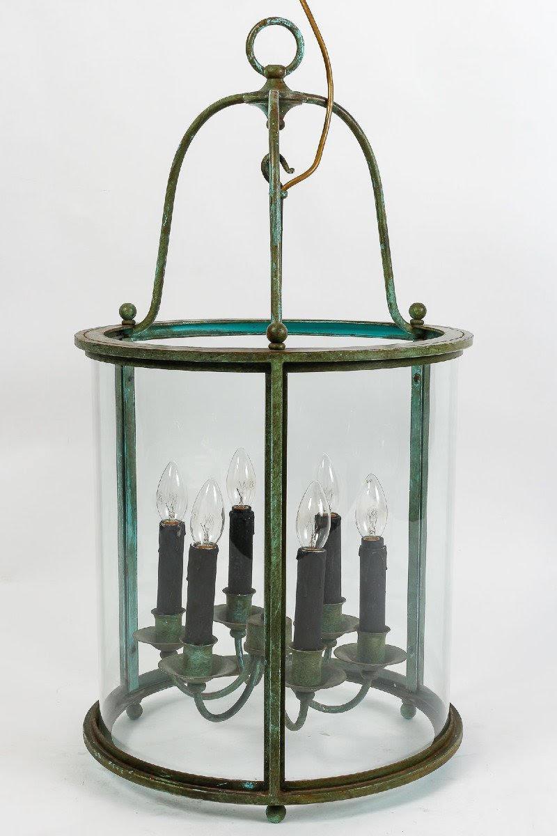Pair of early 20th century wrought iron lanterns.

Pair of 1930-1940 wrought iron lanterns, 6 lights each.  
h: 82cm, d: 42cm