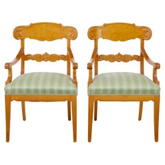 Pair of early 20th Swedish carved birch armchairs