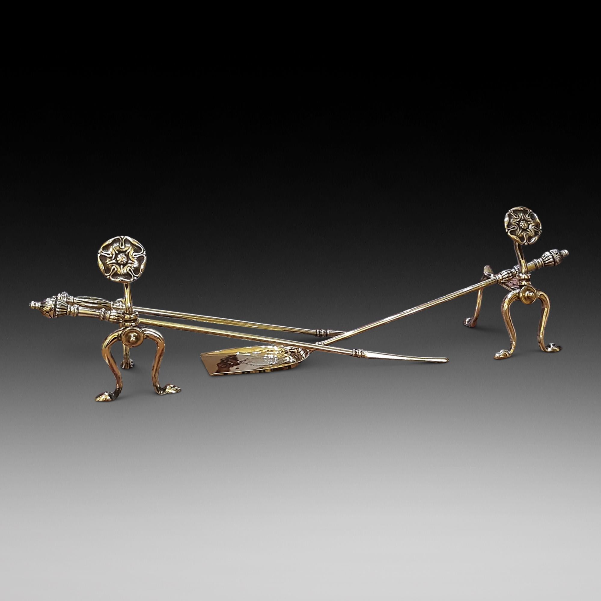 Pair of early 20th century fire dogs with an assortment of tools 5