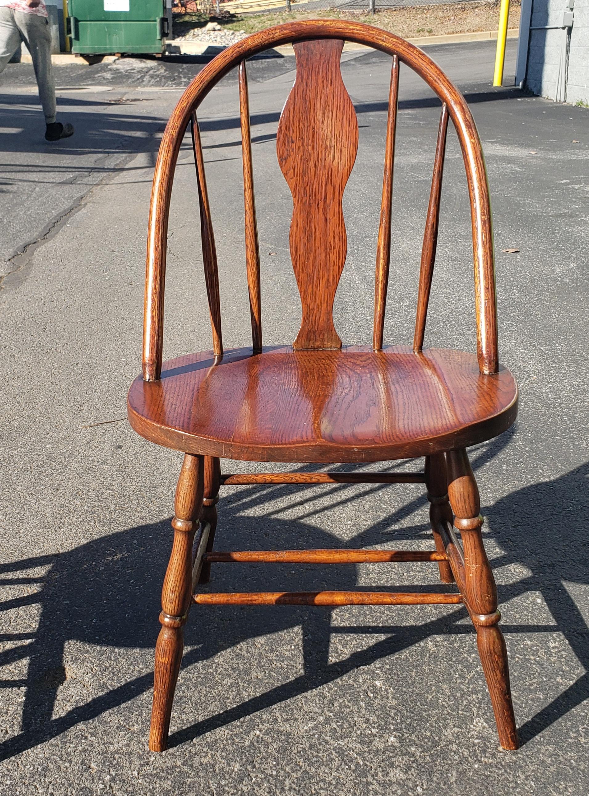 American Colonial Pair of Early American Style Wide Stained Oak Windsor Side Chairs